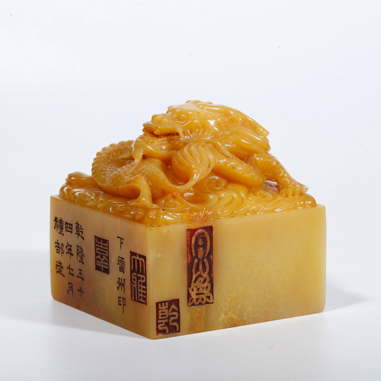 A SEAL WITH CHILONG KNOB CARVED FROM SHOUSHAN STONE: Seal with chilong knob carved from Shoushan stone