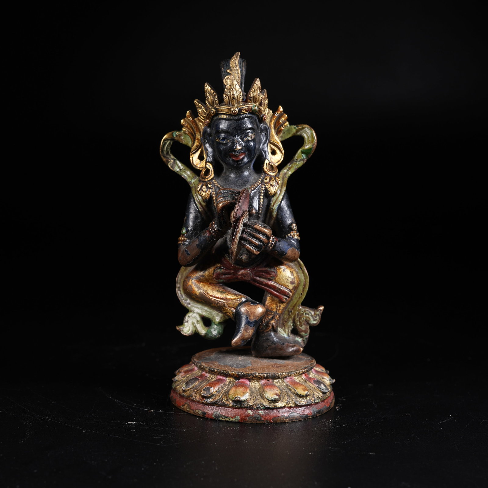 A PAINTED BRONZE DHARMA PROTECTOR STATUE: Painted Bronze Dharma Protector Statue