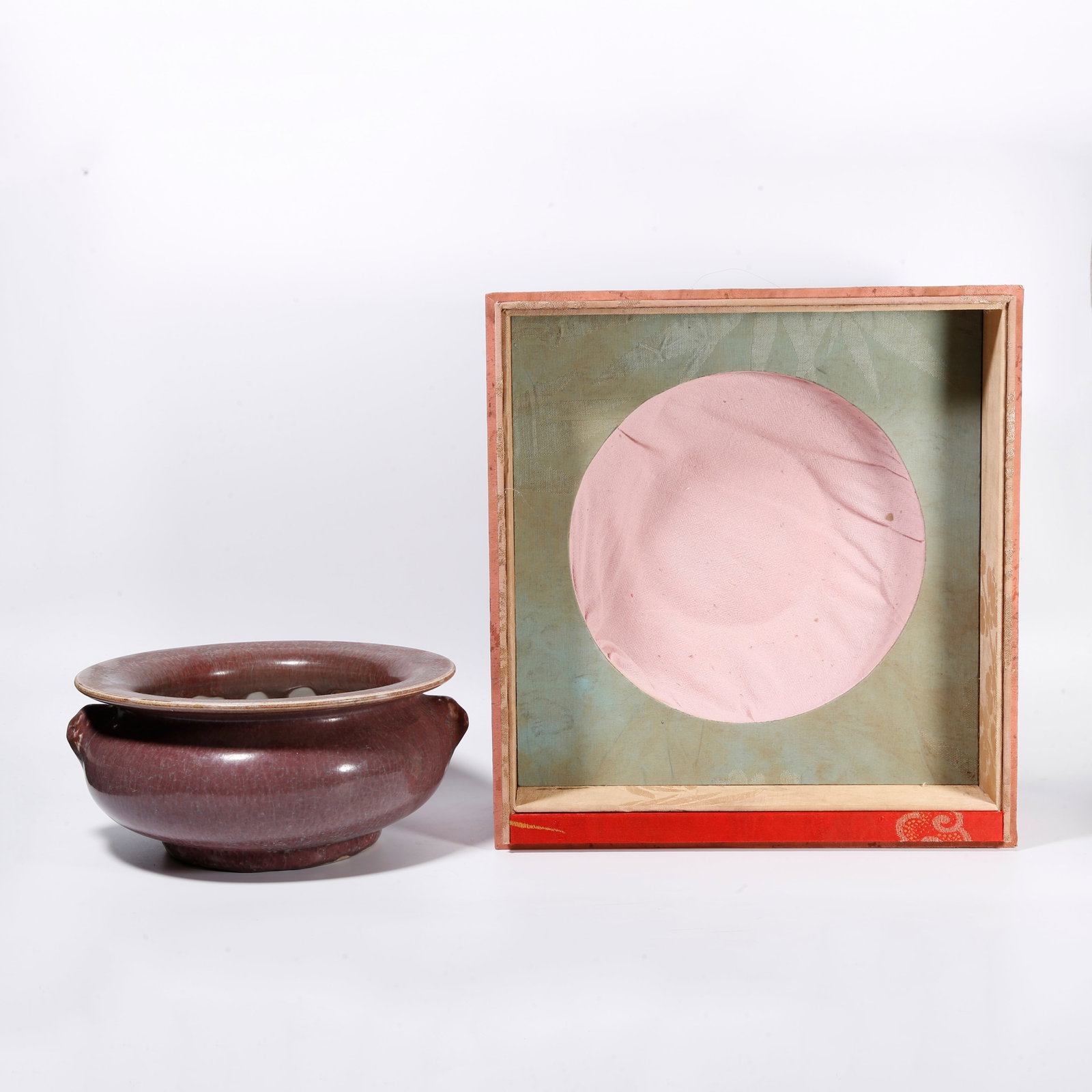 A RED GLAZE CENSER WITH DOUBLE BEAST EARS: Red Glaze Censer with Double Beast Ears
