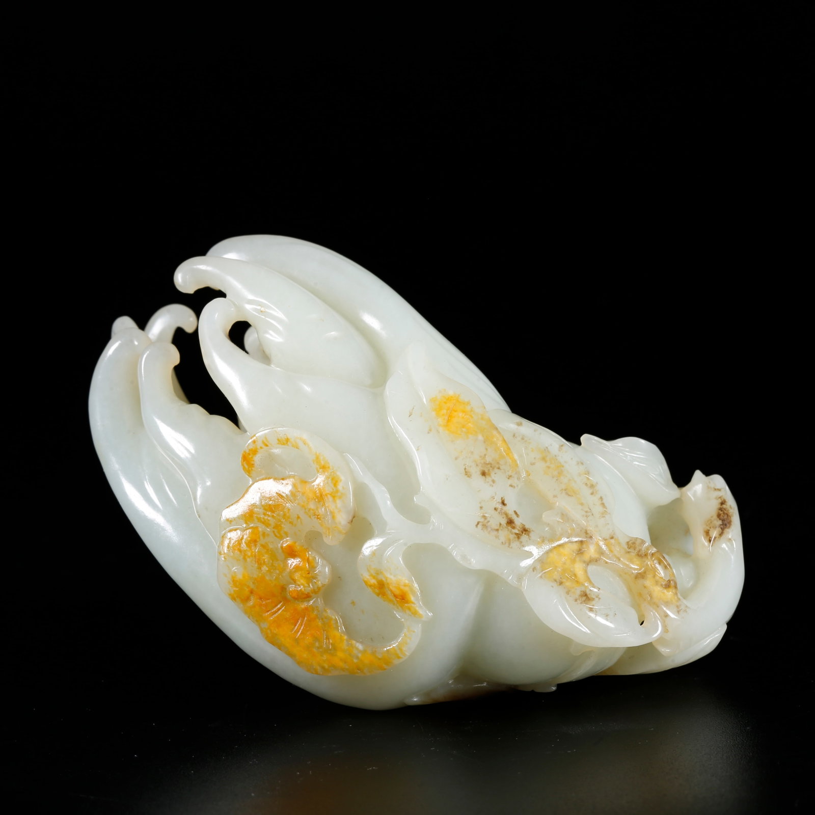 A HETIAN JADE CARVING OF BUDDHA'S HAND: Hetian Jade Carving of Buddha's Hand