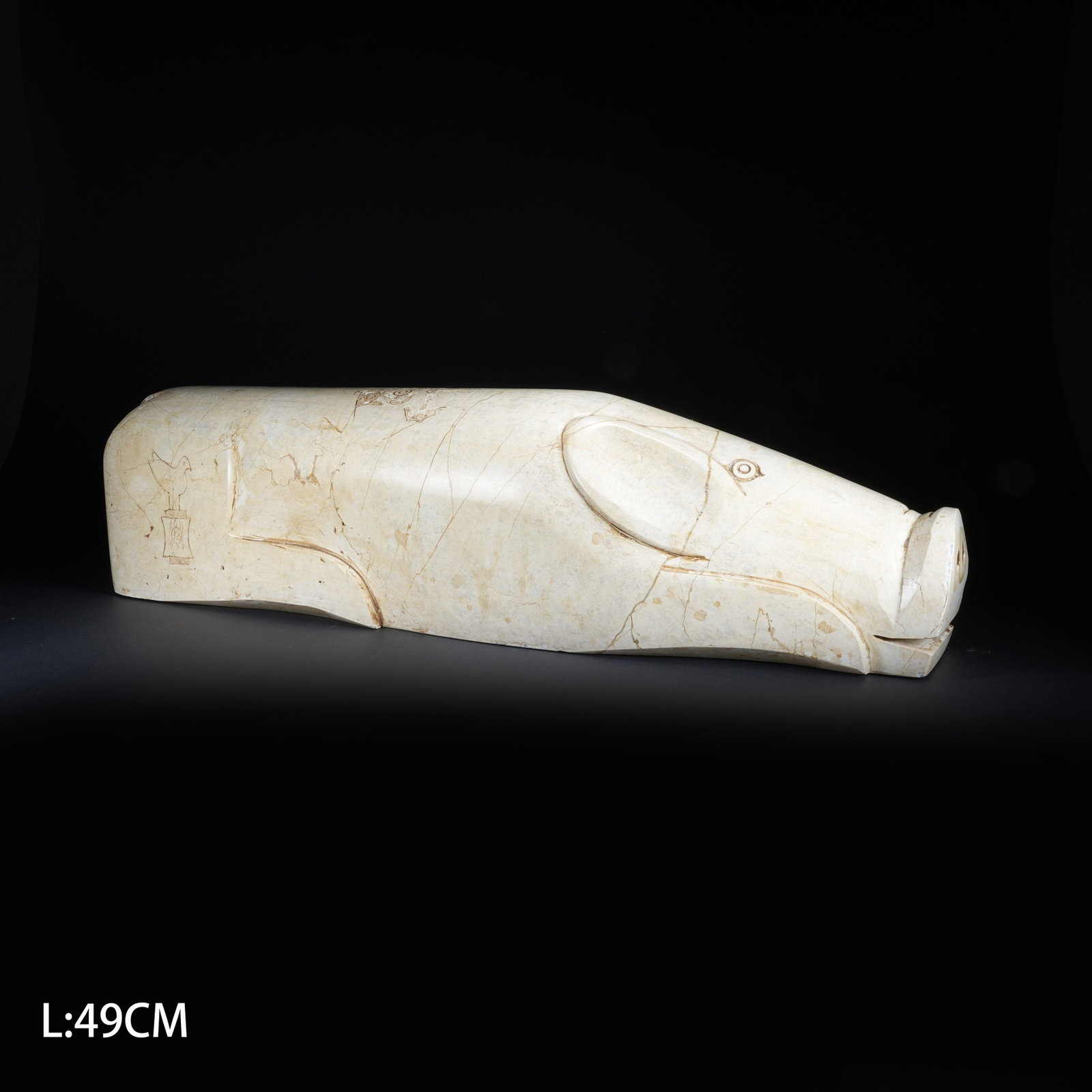 A LARGE RECUMBENT PIG IN CHICKEN-BONE WHITE JADE OF LIANGZHU CULTURE: Large Recumbent Pig in Chicken-bone White Jade of Liangzhu Culture