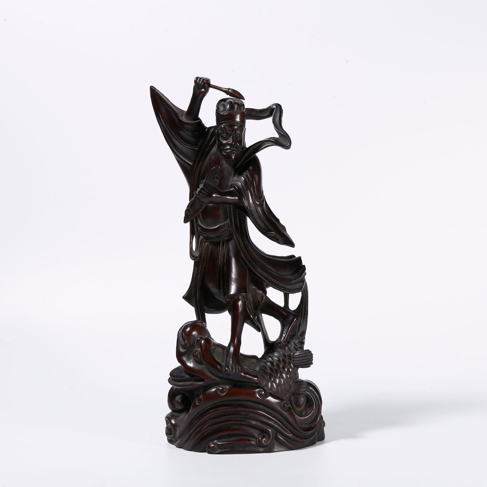 A RED SANDALWOOD ORNAMENT CARVED AS KUIXING HOLDING WRITING BRUSH: Red Sandalwood Ornament Carved as Kuixing Holding Writing Brush