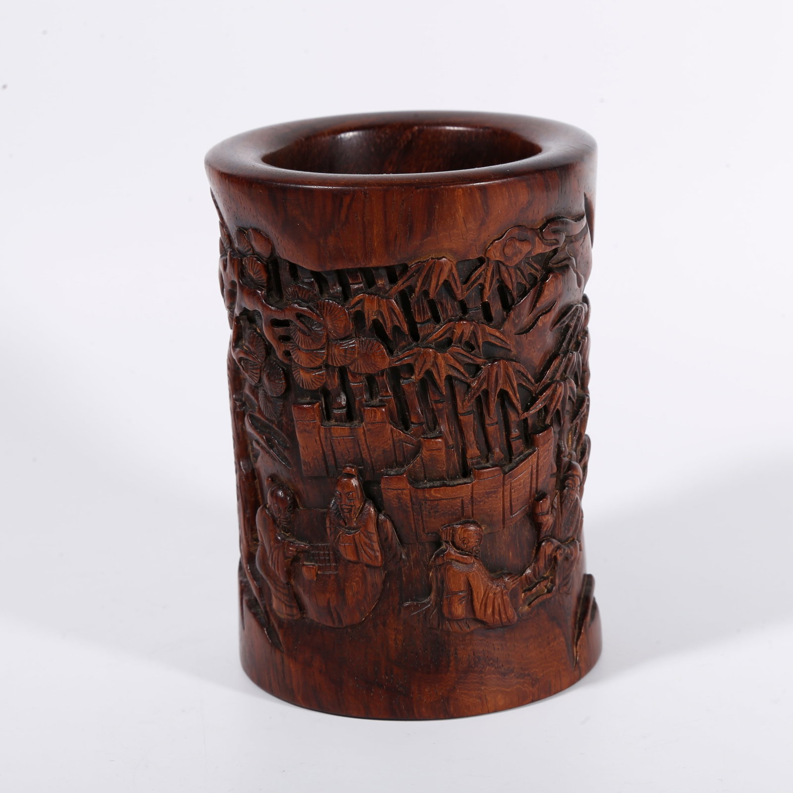 A HUANGHUALI WOOD BRUSH POT CARVED WITH FIGURE STORY PATTERNS: Huanghuali Wood Brush Pot Carved with Figure Story Patterns