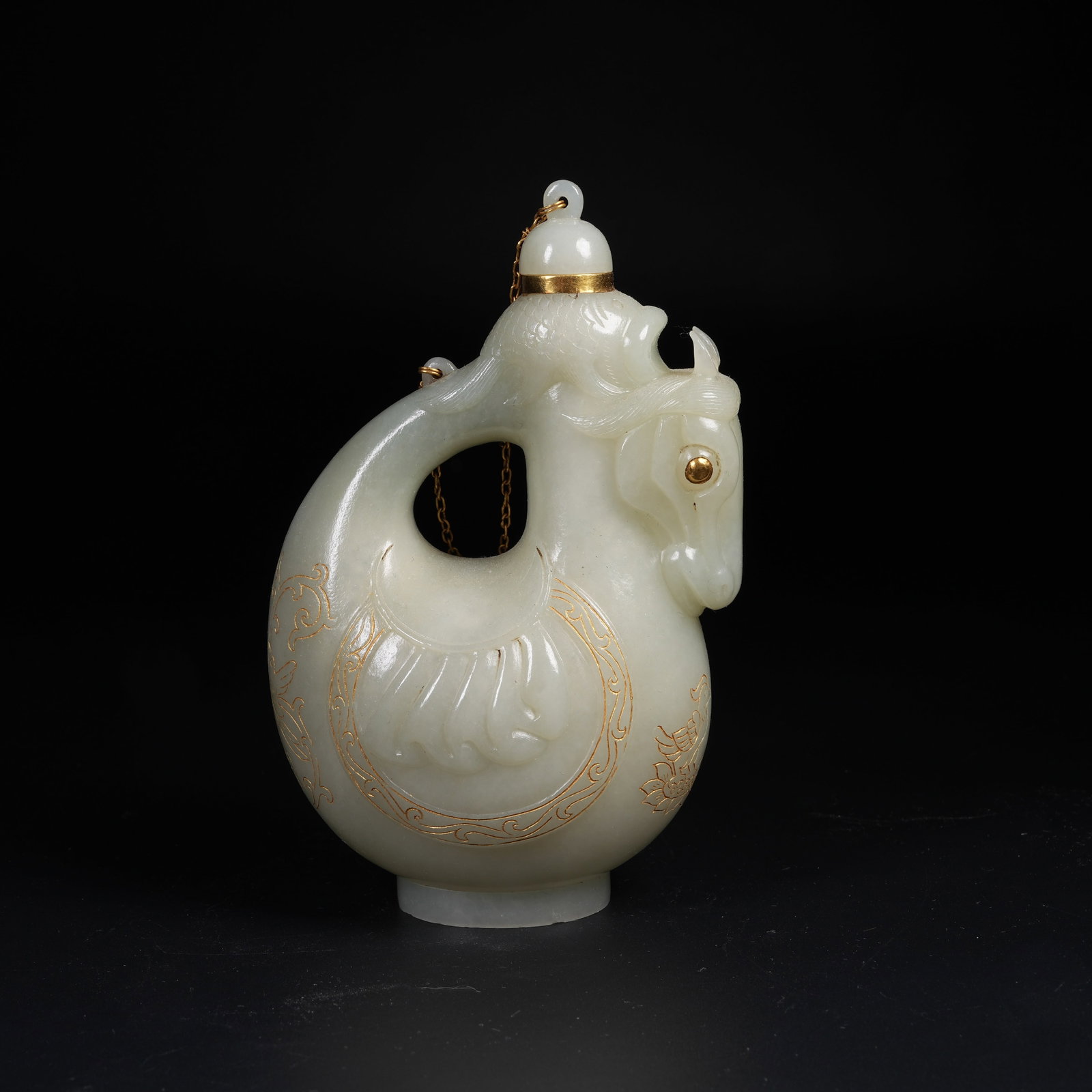 A GOLD WRAPPED HETIAN JADE HORSE-HEAD LEATHER FLASK (1 of 9)