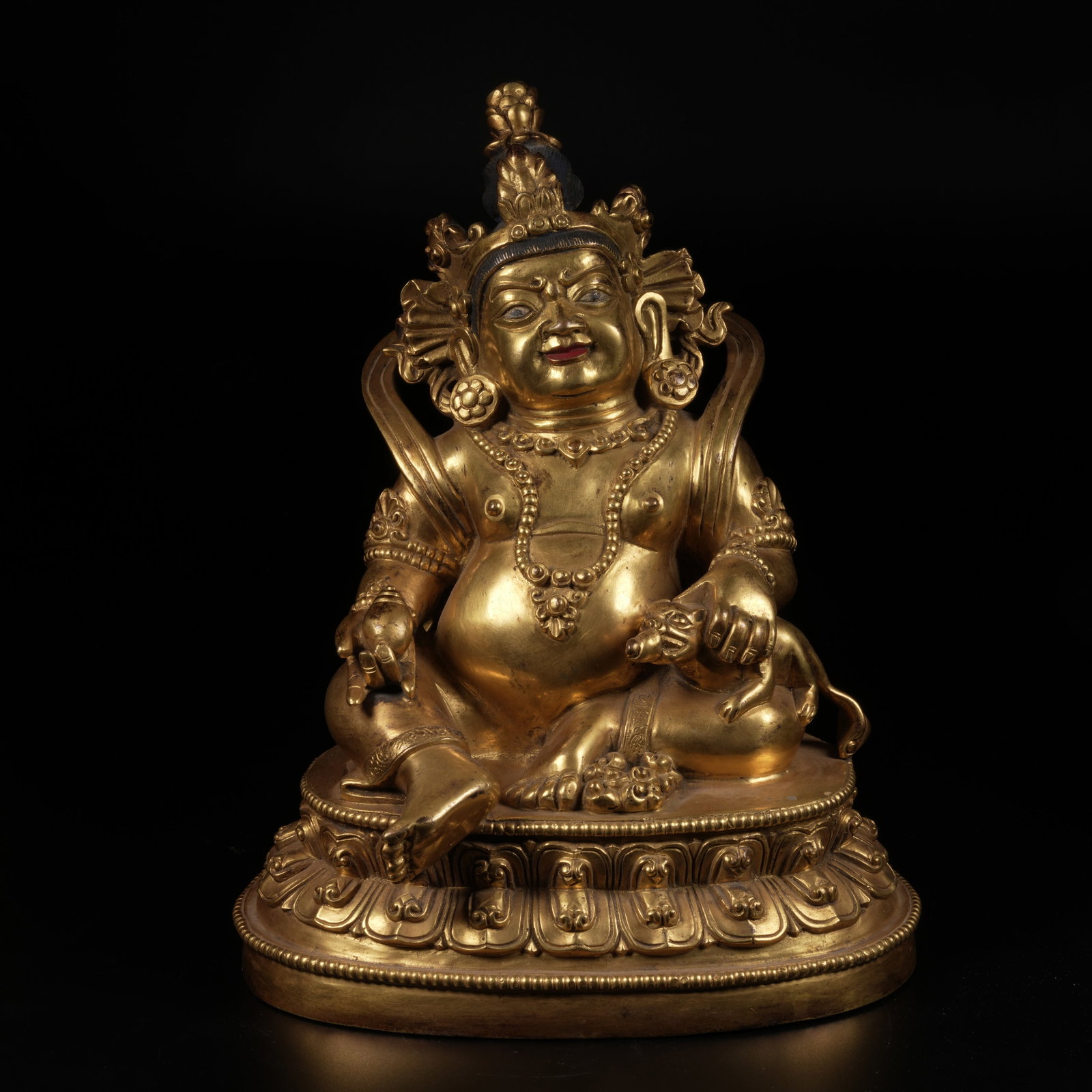 A GILT-BRONZE YELLOW JAMBHALA (WEALTH DEITY) STATUE: Gilt-Bronze Yellow Jambhala (Wealth Deity) Statue