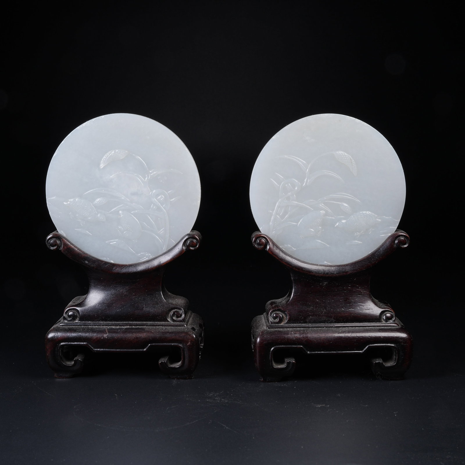 A SET OF WHITE HETIAN JADE SCREENS CARVED WITH PEACEFUL DWELLING MOTIFS: Set of White Hetian Jade Screens Carved with Peaceful Dwelling Motifs