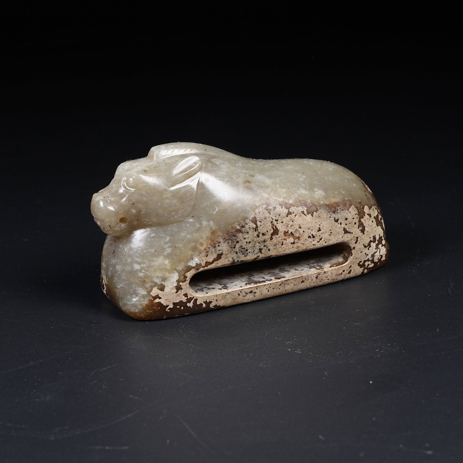 A ANCIENT JADE AUSPICIOUS BEAST BELT ORNAMENT: Ancient Jade Auspicious Beast Belt Ornament