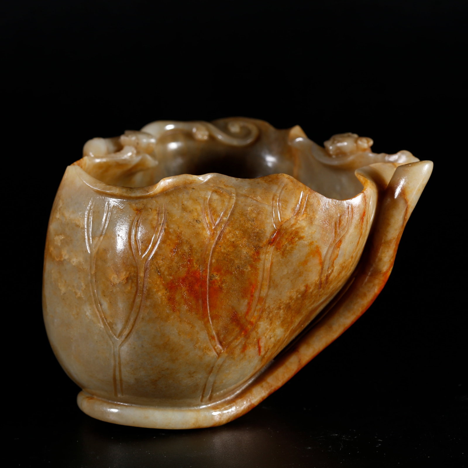 A HETIAN JADE LOTUS WASHER CARVED WITH DRAGON PATTERNS: Hetian Jade Lotus Washer Carved with Dragon Patterns