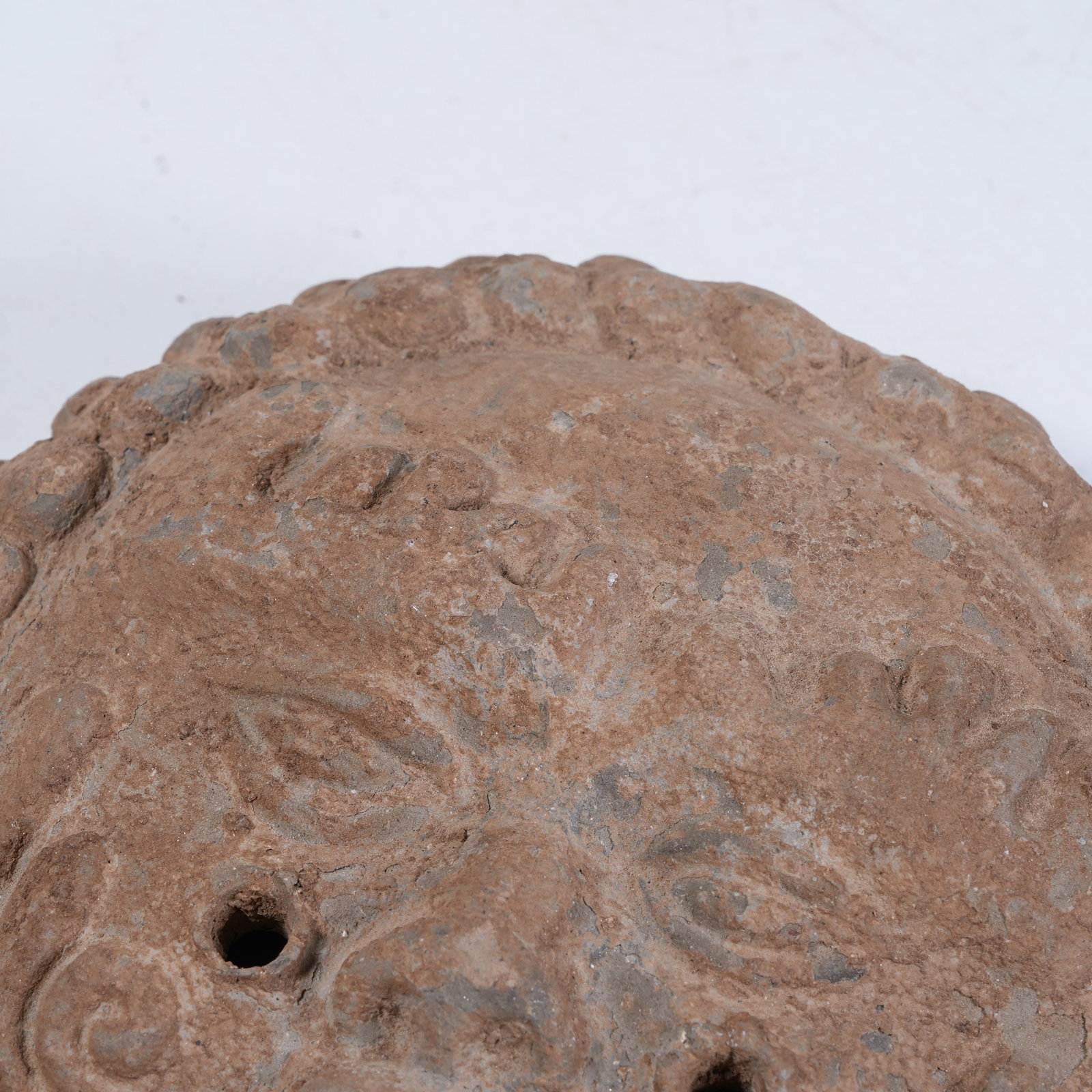 A POTTERY EAVES TILE WITH HUMAN FACE PATTERN - 2