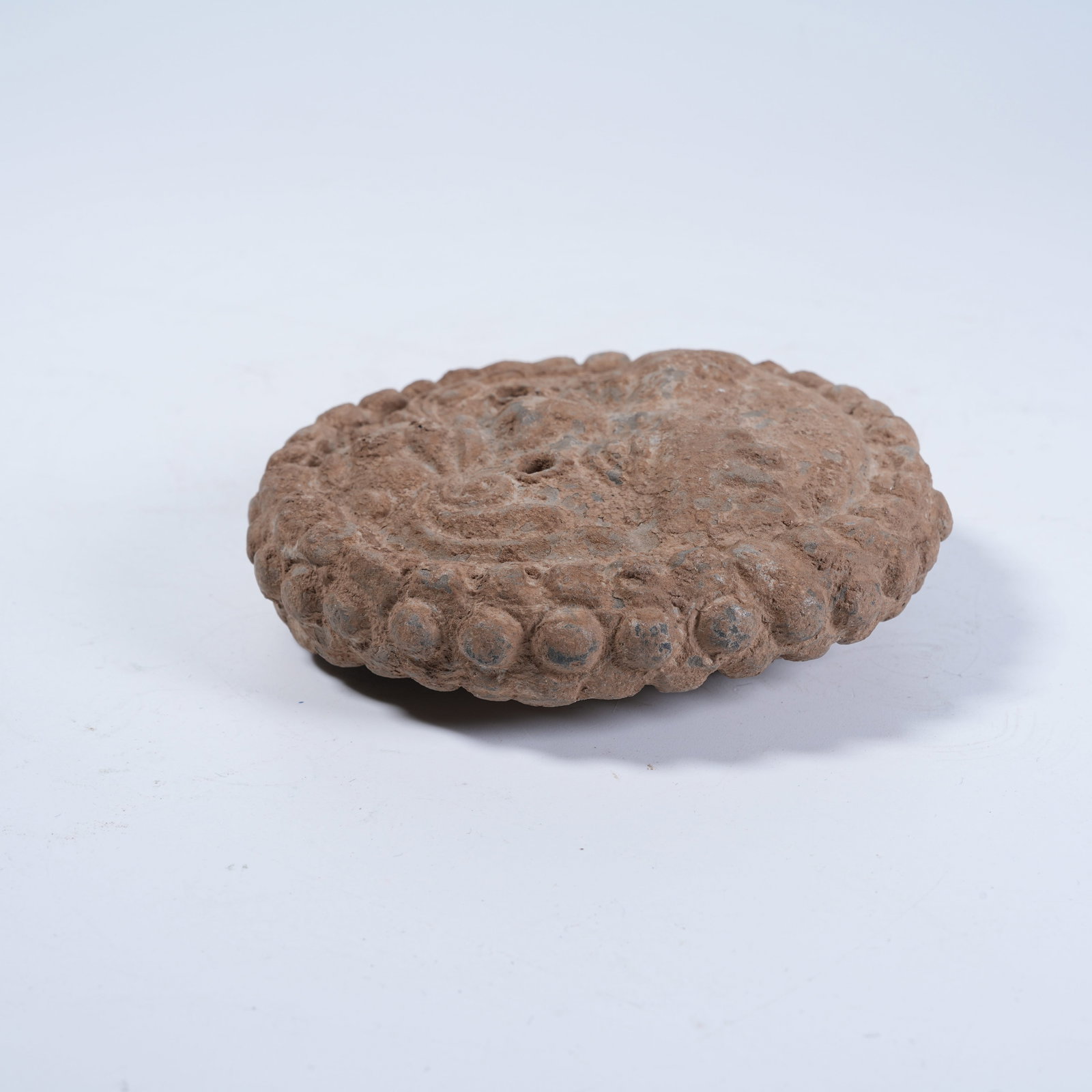 A POTTERY EAVES TILE WITH HUMAN FACE PATTERN - 6