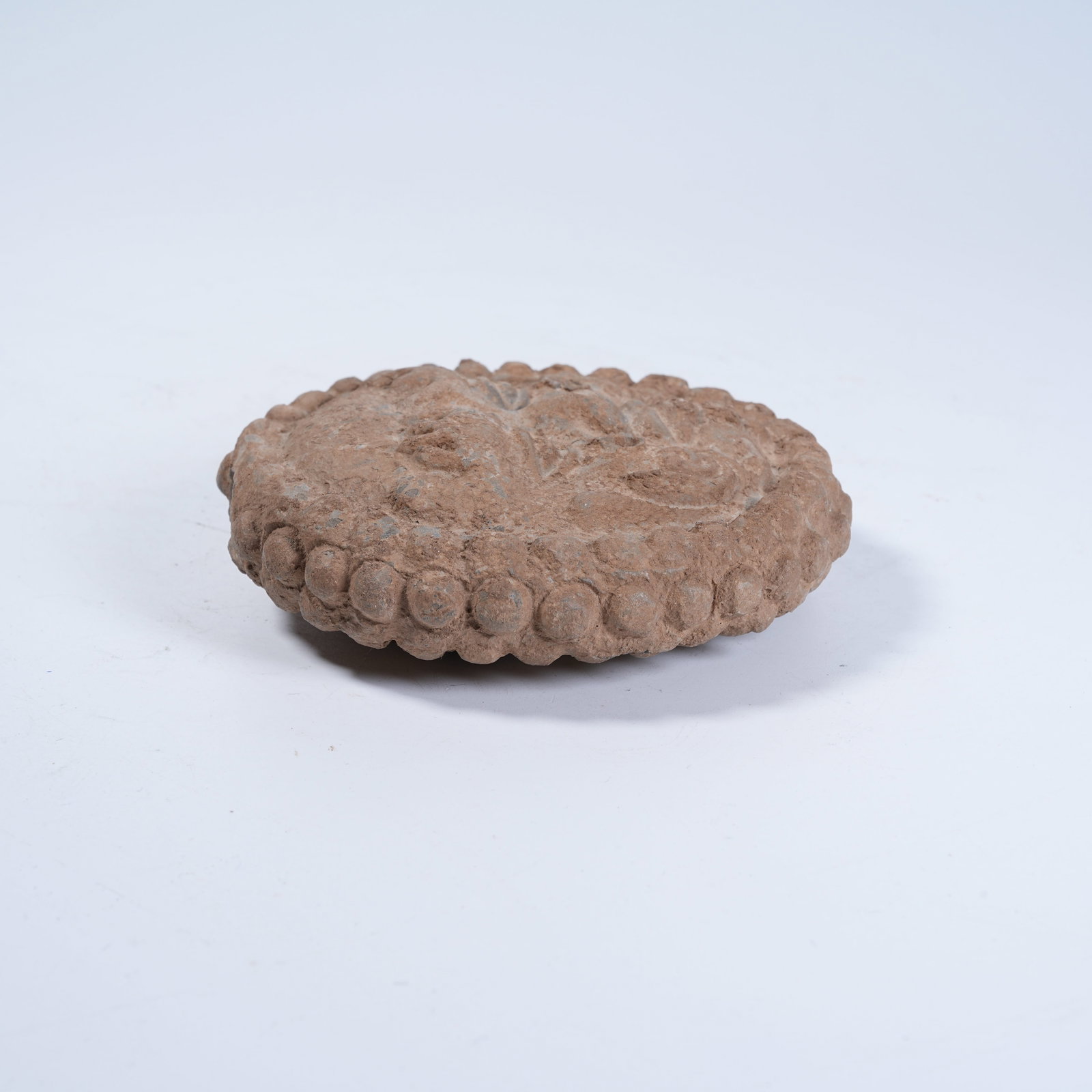 A POTTERY EAVES TILE WITH HUMAN FACE PATTERN - 8