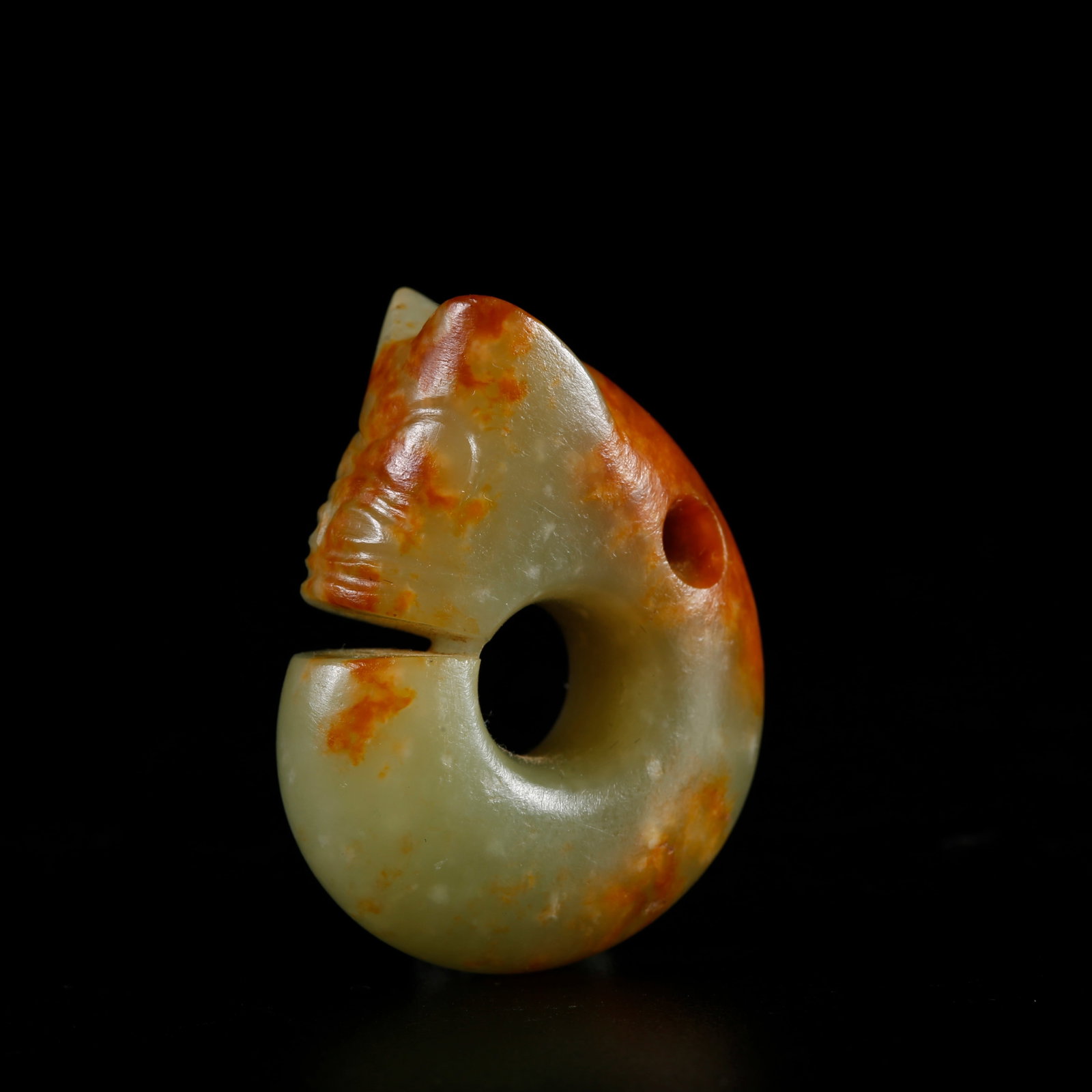 A ANCIENT JADE PIG-DRAGON PENDANT (1 of 9)