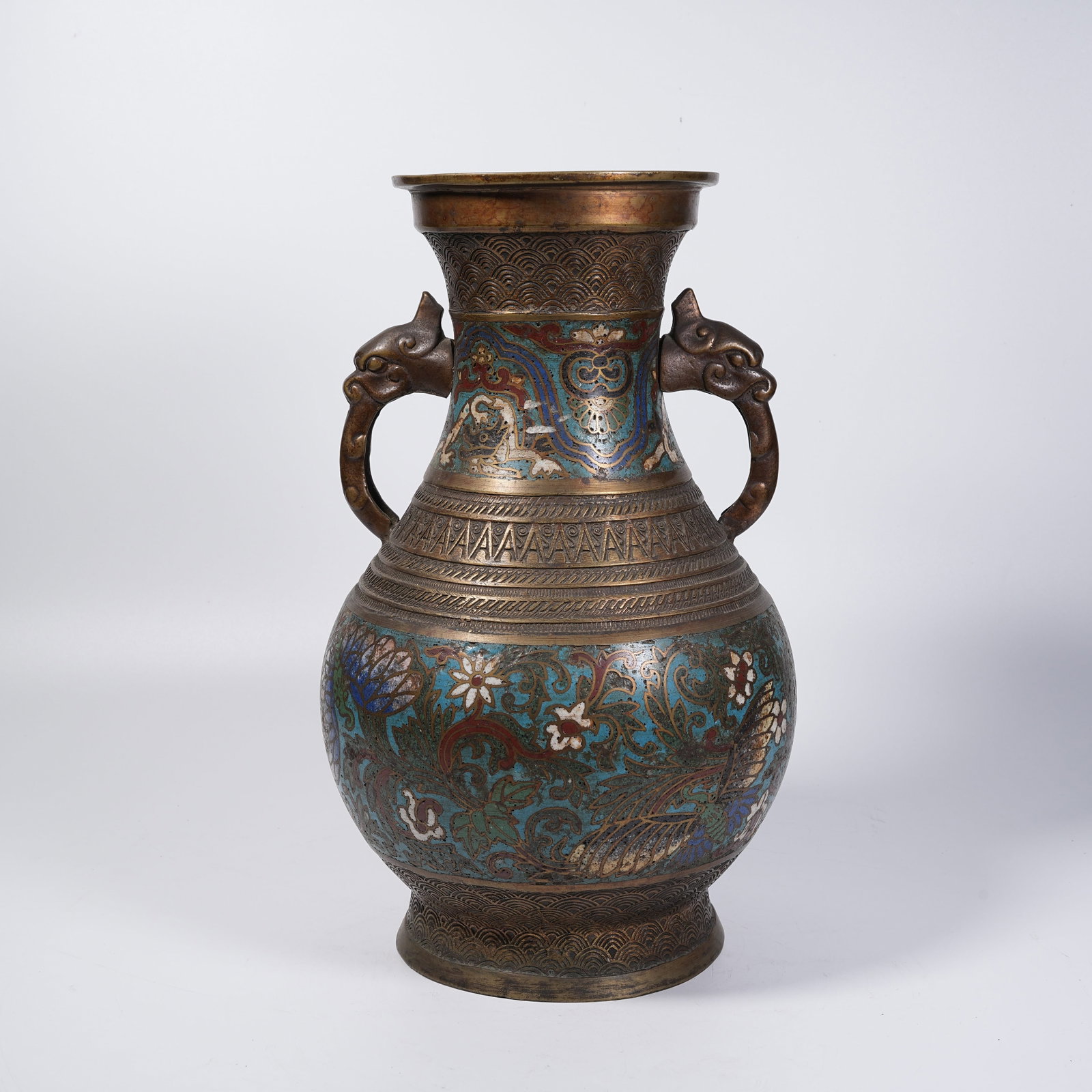 A CLOISONNE ZUN VESSEL WITH FLOWER AND BUTTERFLY PATTERNS AND BEAST EARS ON BRONZE BODY: Cloisonne Zun Vessel with Flower and Butterfly Patterns and Beast Ears on Bronze Body