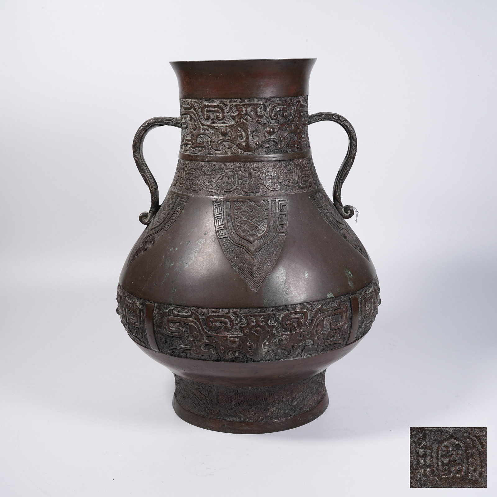 A BRONZE ZUN VESSEL WITH BEAST MASK PATTERNS: Bronze Zun Vessel with Beast Mask Patterns