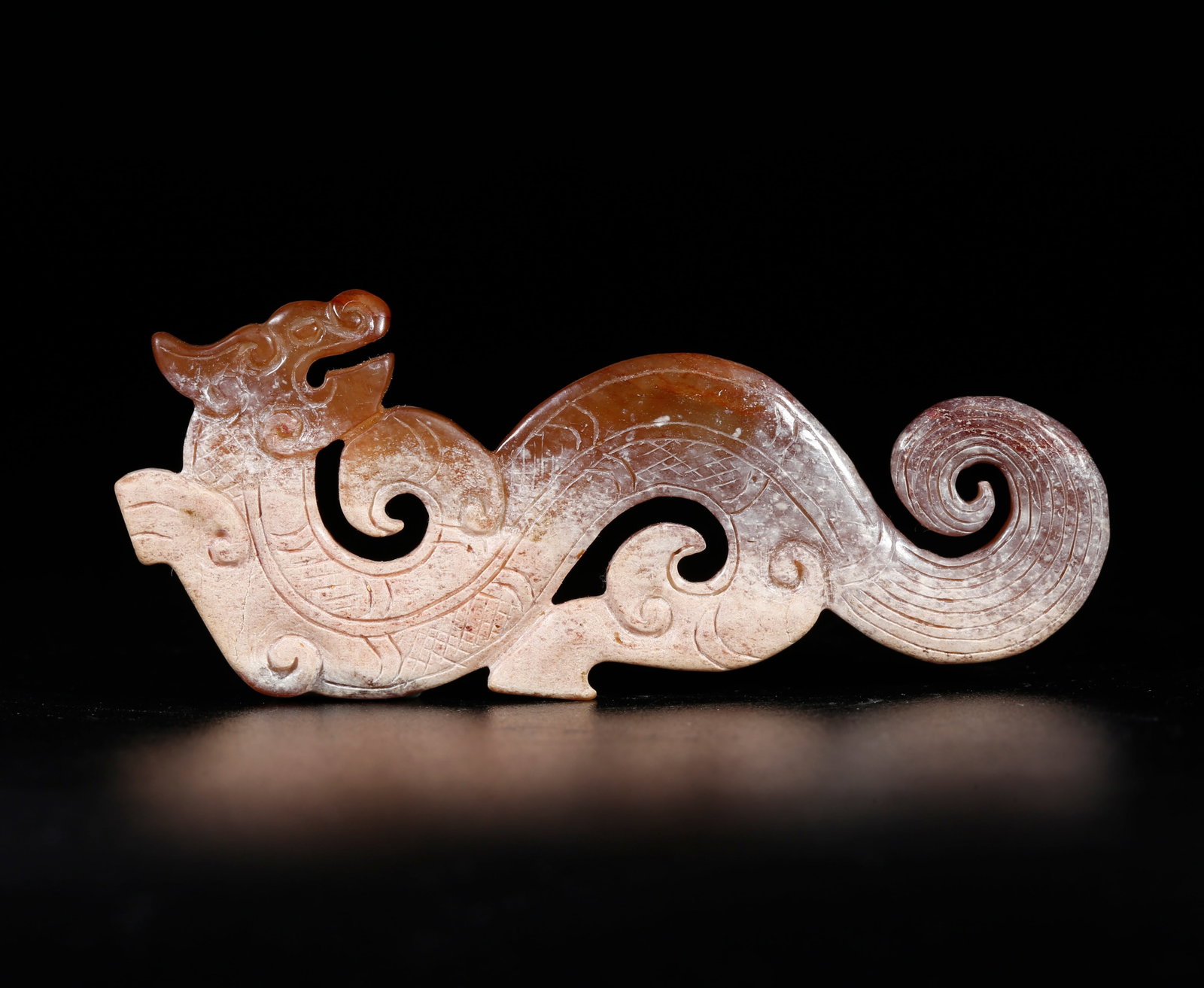 A ANCIENT JADE DRAGON-SHAPED PENDANT: Ancient Jade Dragon-shaped Pendant