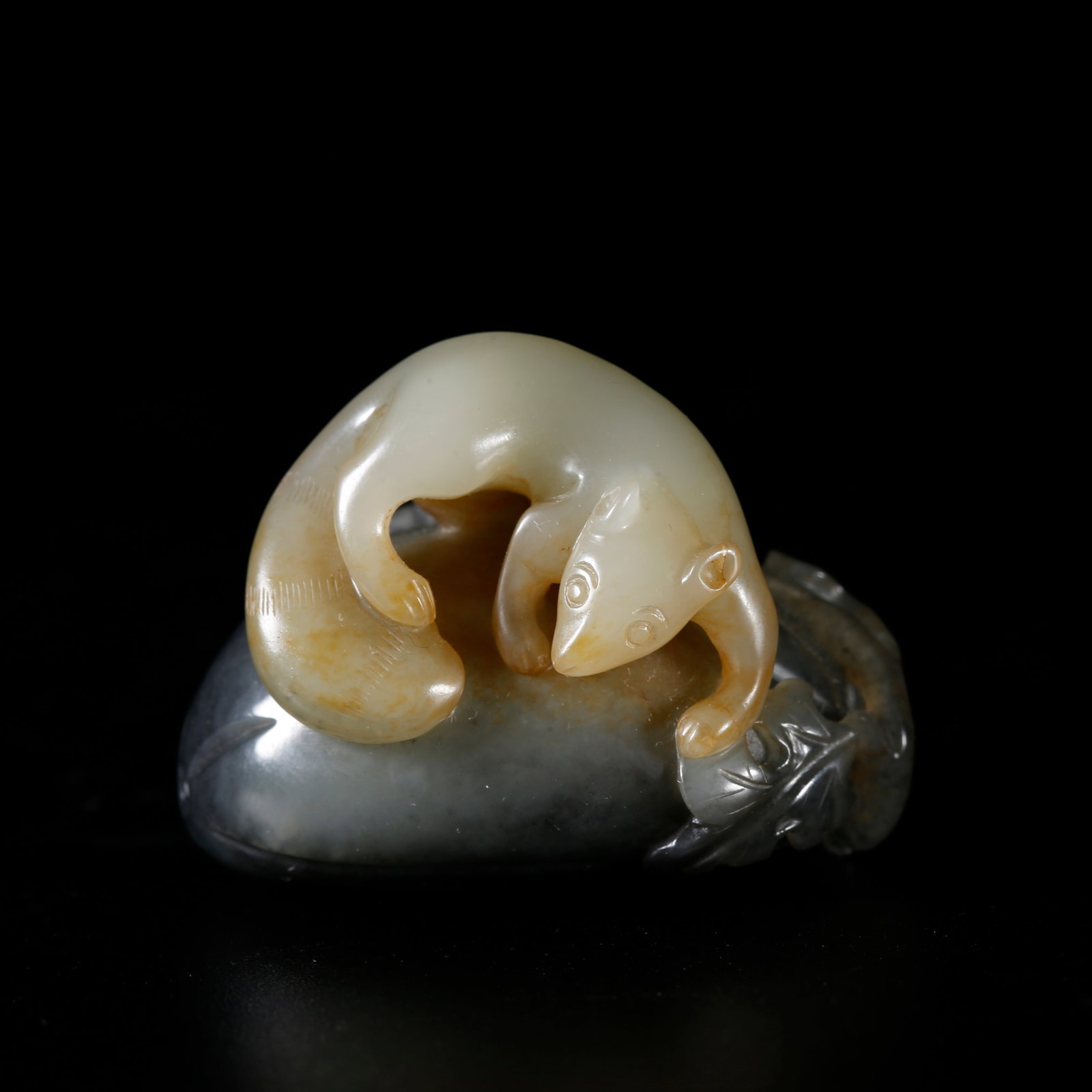 A HETIAN JADE ORNAMENT CARVED AS MELONS AND FRUITS: Hetian Jade Ornament Carved as Melons and Fruits