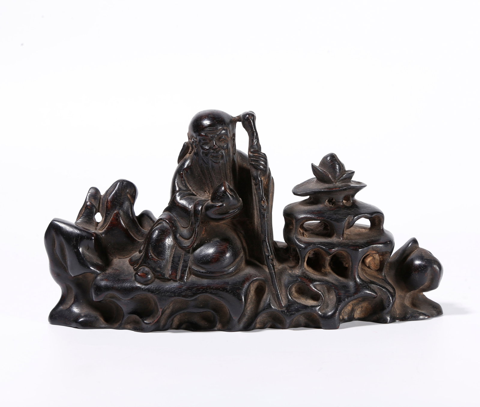 A RED SANDALWOOD ORNAMENT CARVED AS GOD OF LONGEVITY: Red Sandalwood Ornament Carved as God of Longevity