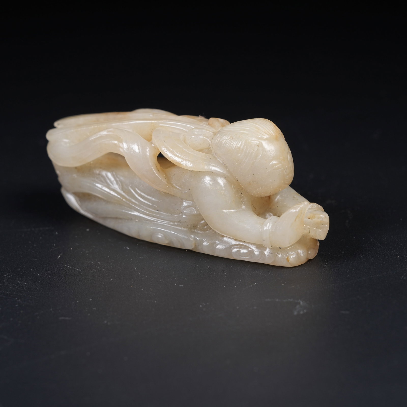A ANCIENT JADE FLYING APSARAS ORNAMENT: Ancient Jade Flying Apsaras Ornament