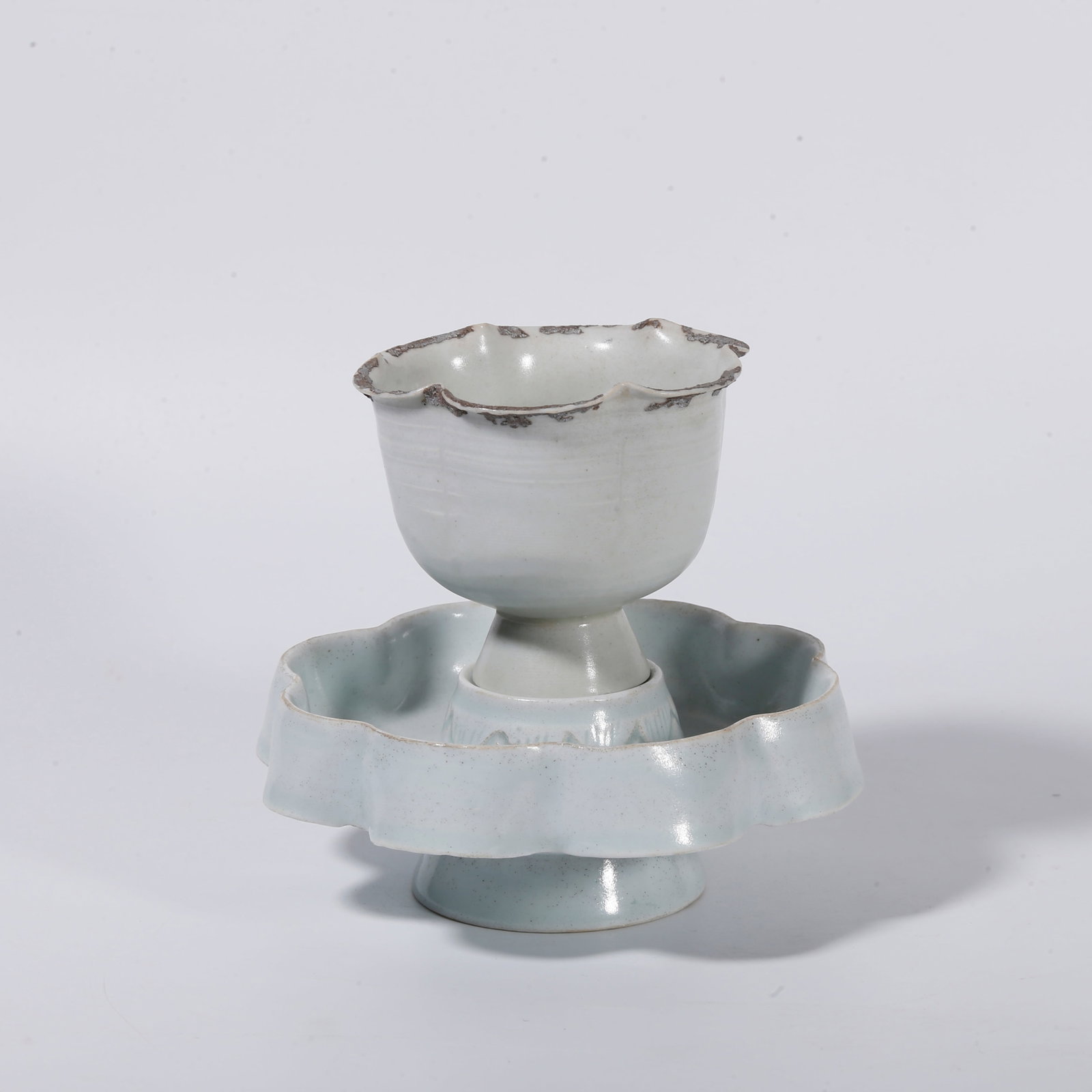 A SET OF SHADOW BLUE GLAZED TEA CUPS (1 of 9)