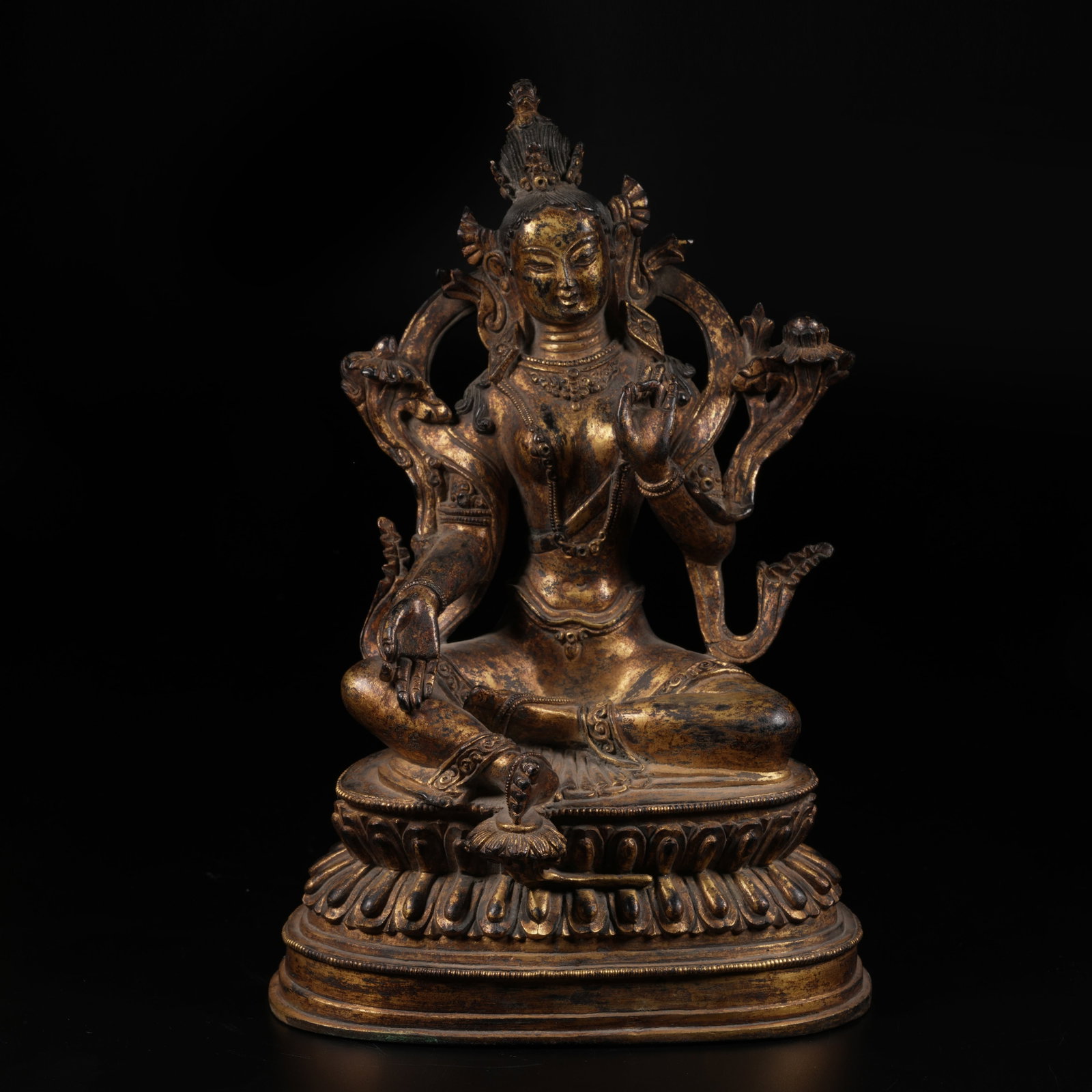 A GILT-BRONZE GREEN TARA STATUE: Gilt-Bronze Green Tara Statue