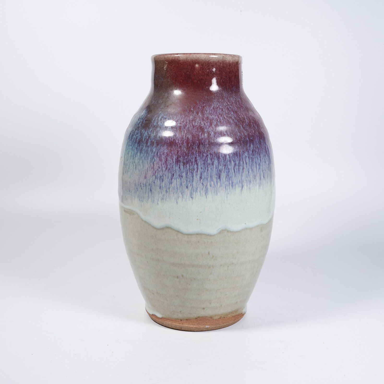 A FLAMBE GLAZED OLIVE-SHAPED JAR (1 of 9)