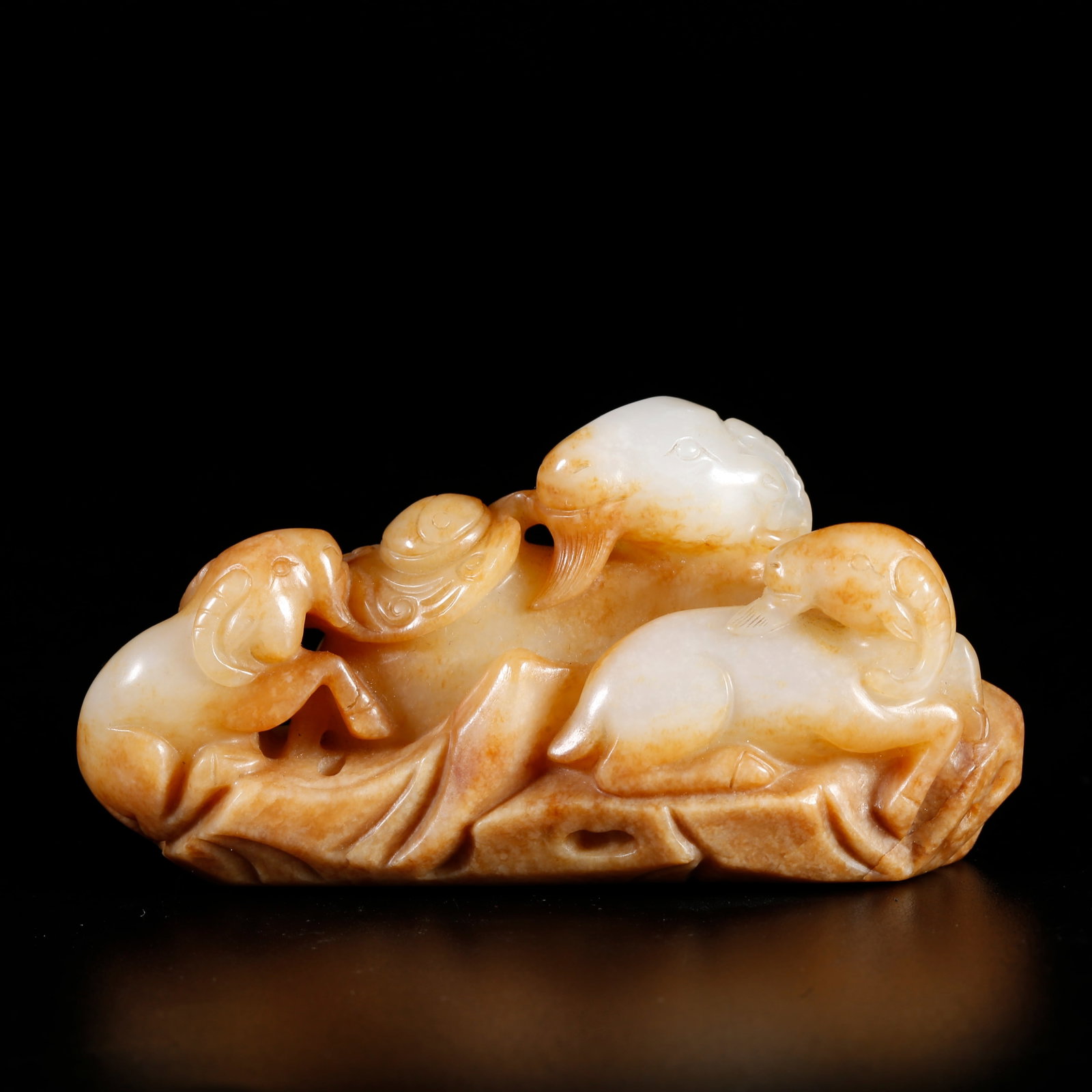 A HETIAN JADE ORNAMENT OF THREE RAMS BRINGING PROSPERITY (1 of 9)