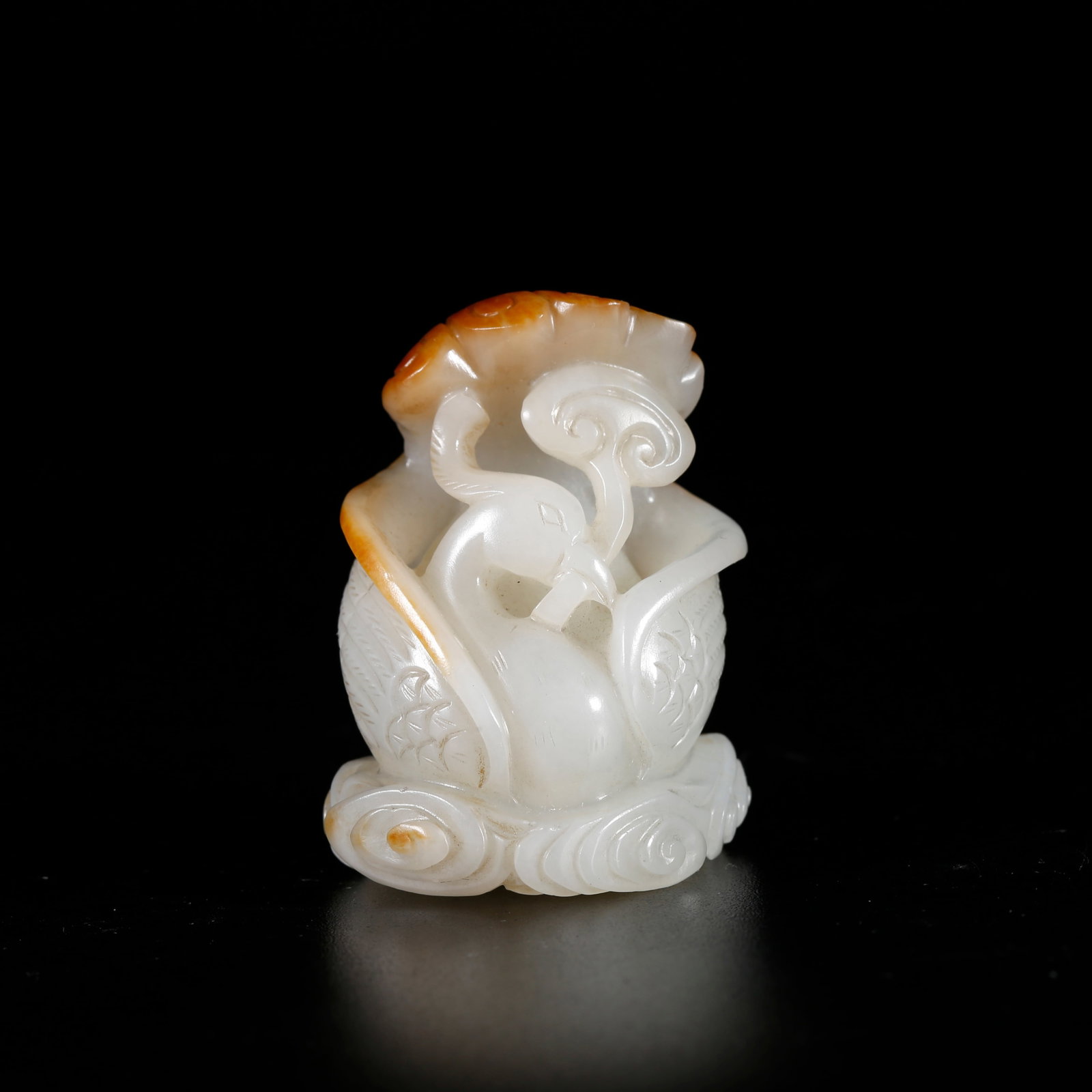A HETIAN JADE ORNAMENT IN BEAST SHAPE: Hetian Jade Ornament in Beast Shape