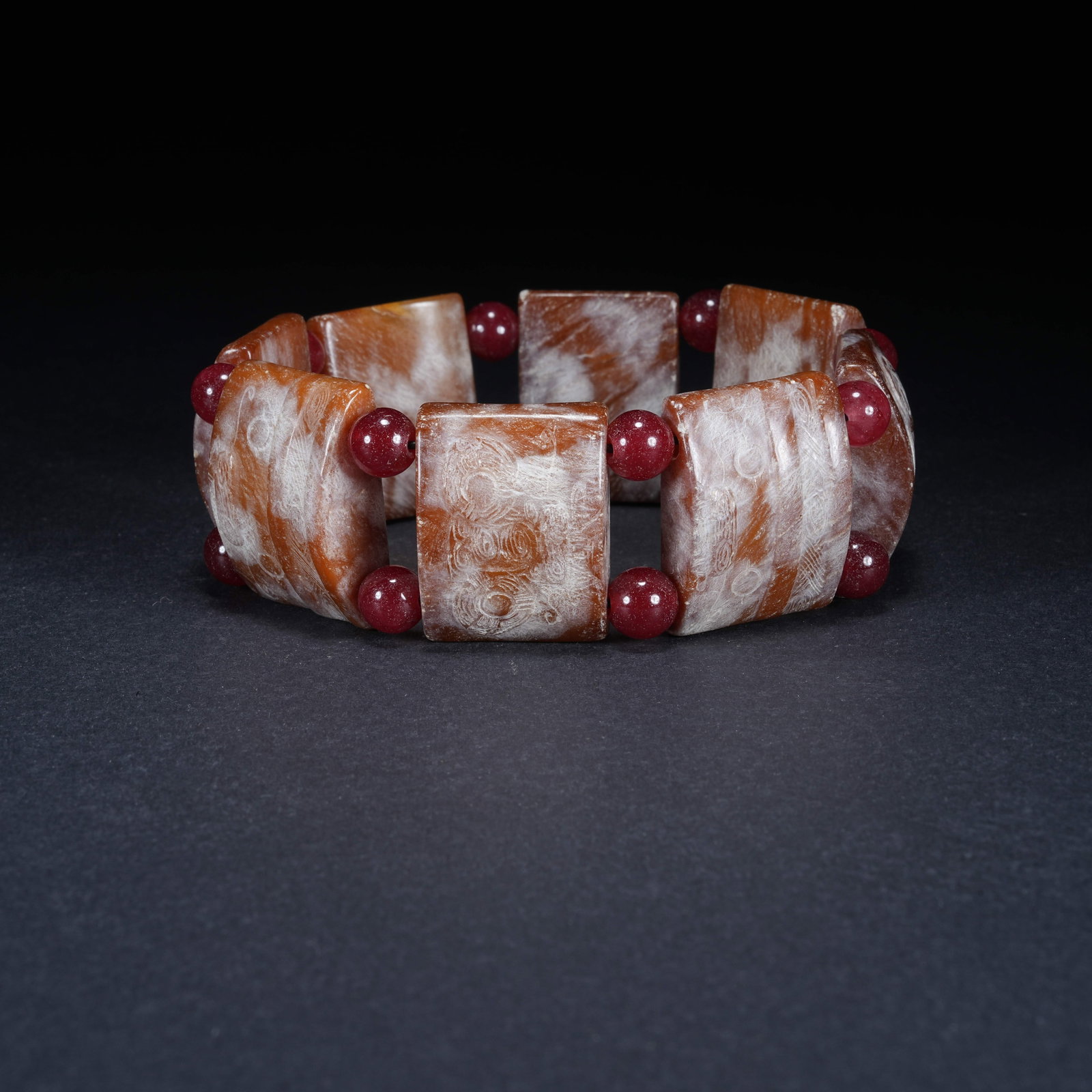 A STAINED ANCIENT JADE WRIST BAND OF LIANGZHU CULTURE: Stained Ancient Jade Wrist Band of Liangzhu Culture