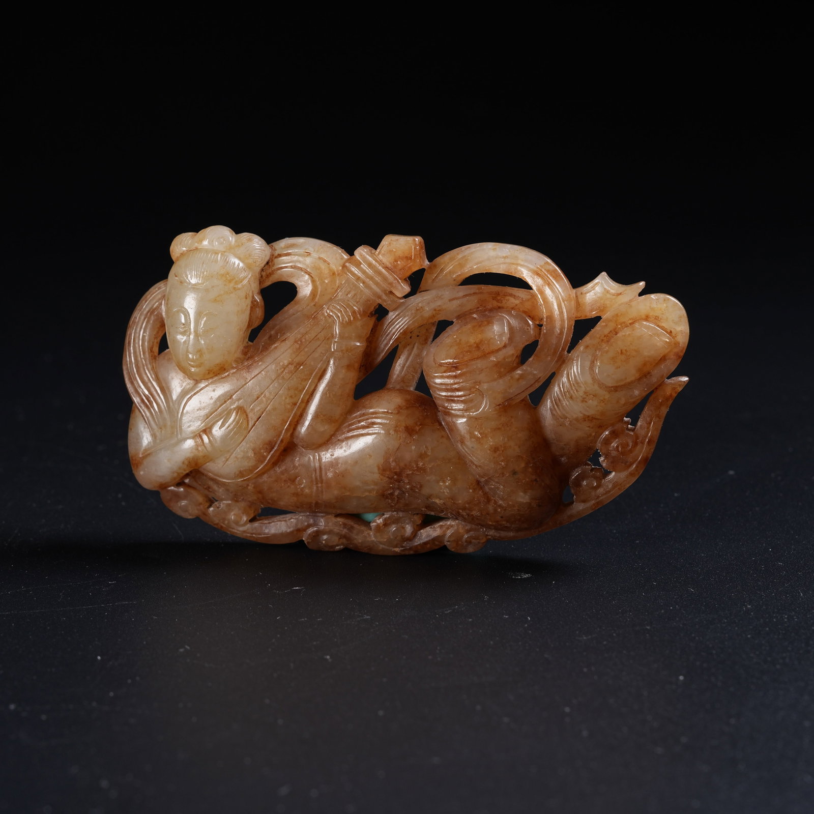 A MEDIEVAL JADE FLYING APSARAS PENDANT (1 of 8)