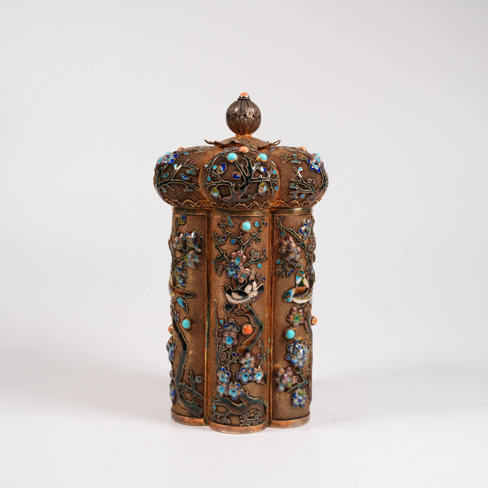 A FLOWER-SHAPED SILVER COVERED JAR WITH COLORED ENAMEL, INLAID GEMSTONES AND MAGPIE-ON-PLUM BLOSSOM: Flower-shaped Silver Covered Jar with Colored Enamel, Inlaid Gemstones and Magpie-on-Plum Blossom Motif