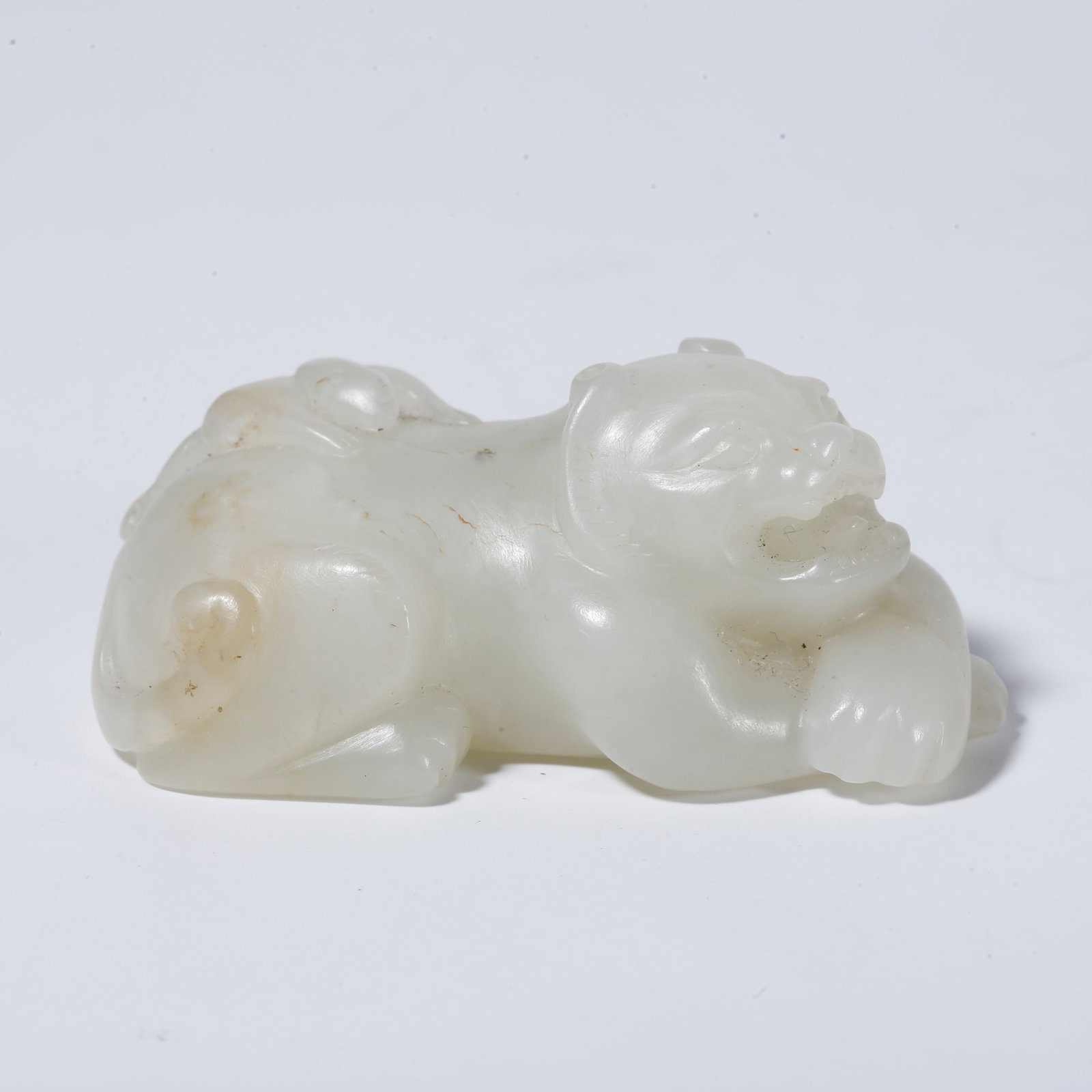A HETIAN JADE ORNAMENT CARVED IN BEAR SHAPE (1 of 9)