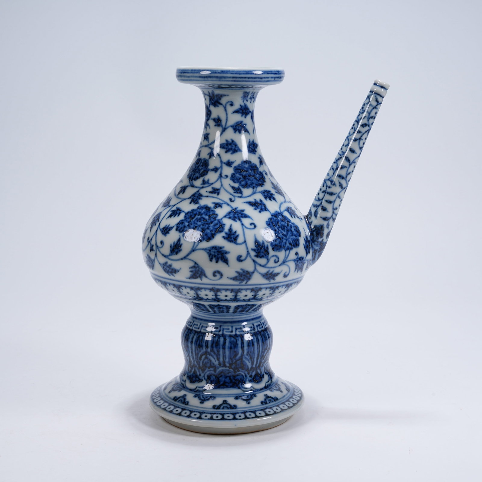 A UNDERGLAZE BLUE KUNDI VASE WITH INTERLOCKING FLORAL SCROLLS (1 of 11)