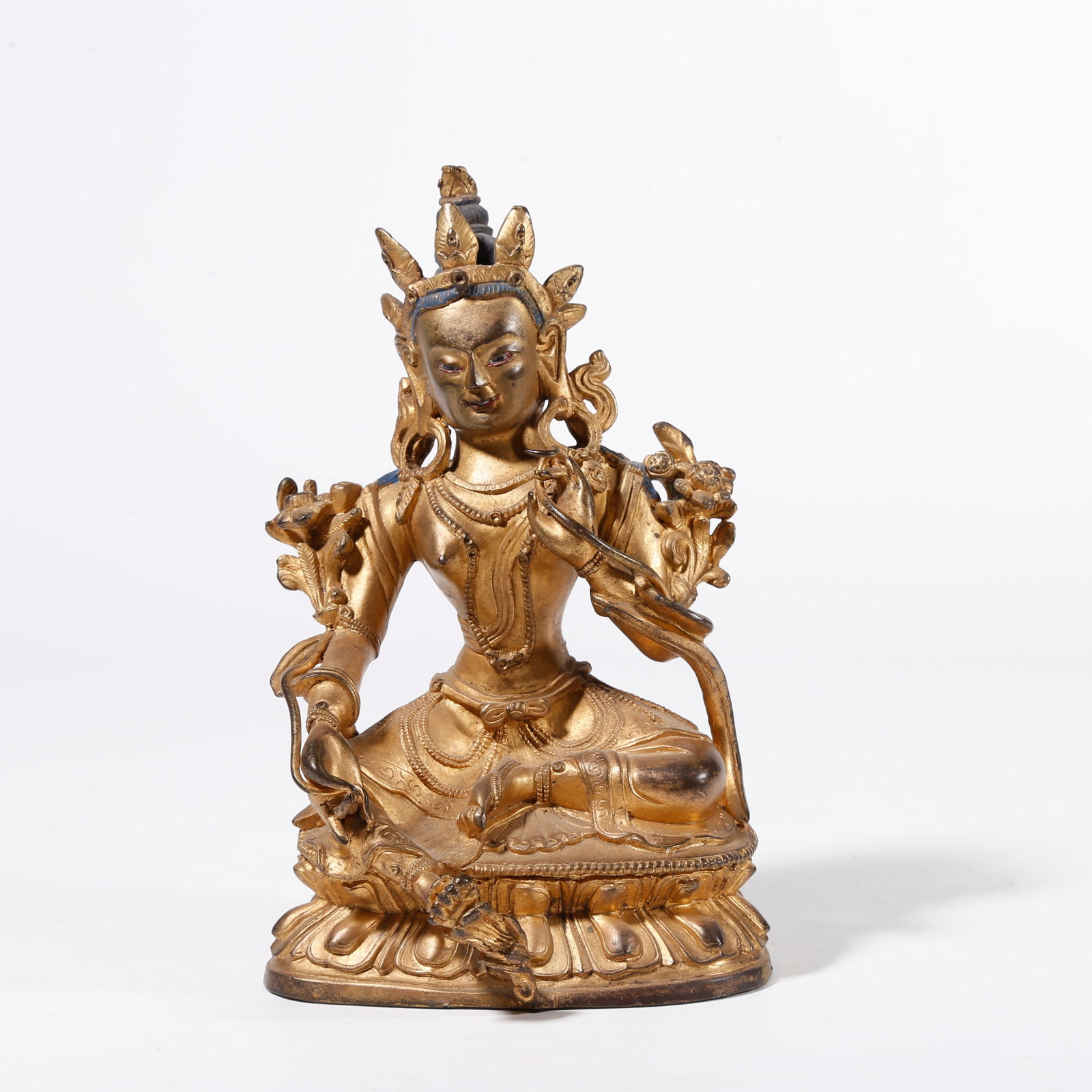 A GILDED BRONZE STATUE OF TARA: Gilded Bronze Statue of Tara