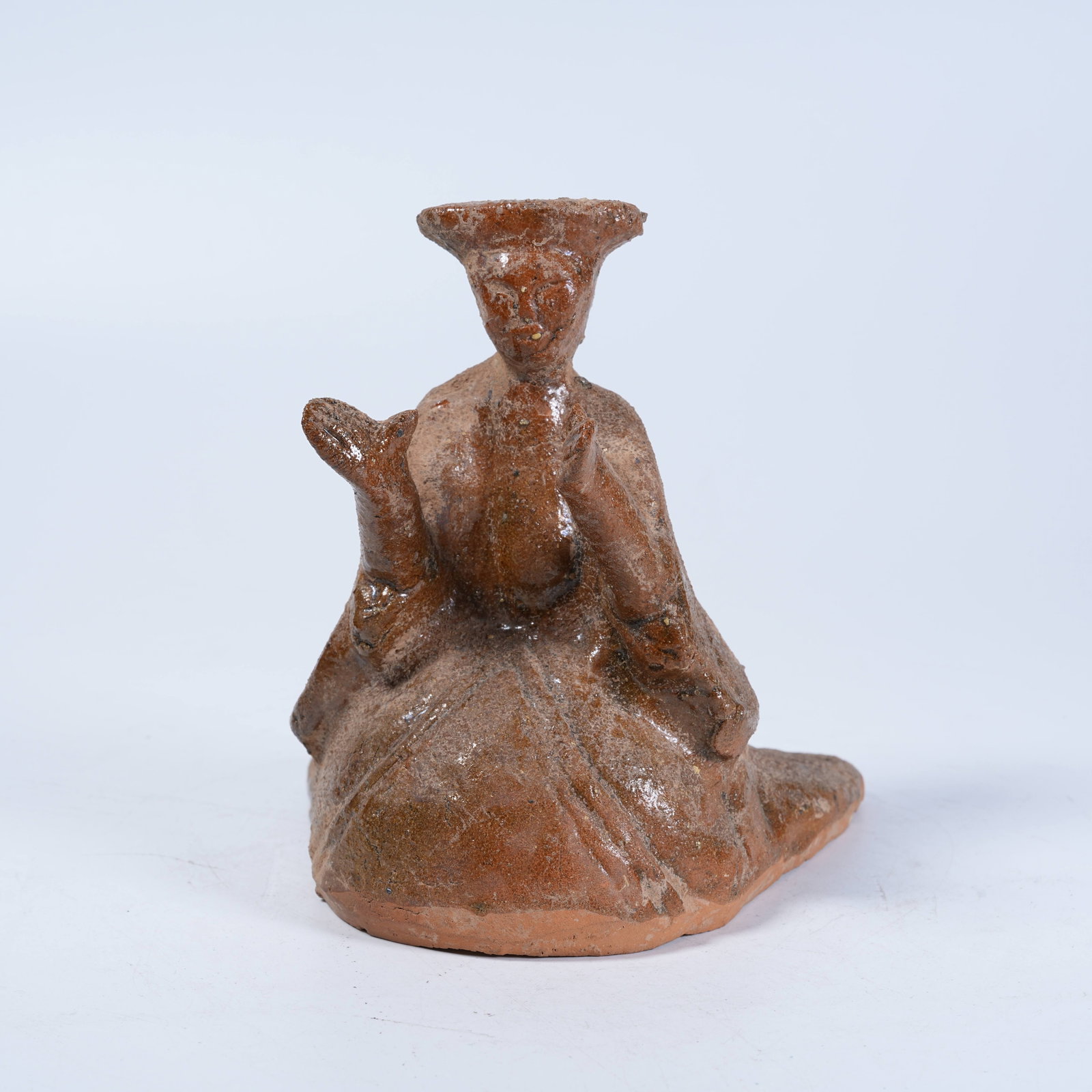 A YELLOW GLAZE POTTERY KNEELING MUSICIAN FIGURINE (1 of 8)