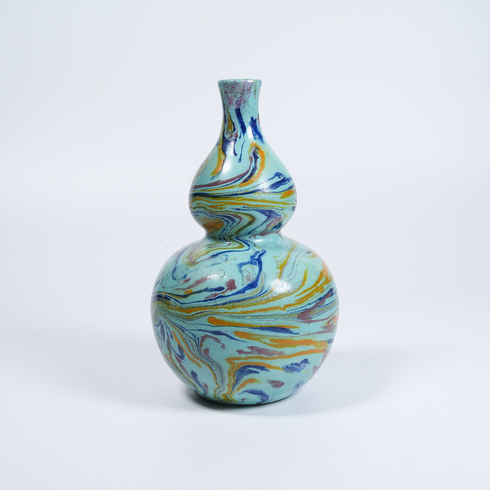A TWISTED GLAZE GOURD-SHAPED VASE: Twisted Glaze Gourd-shaped Vase