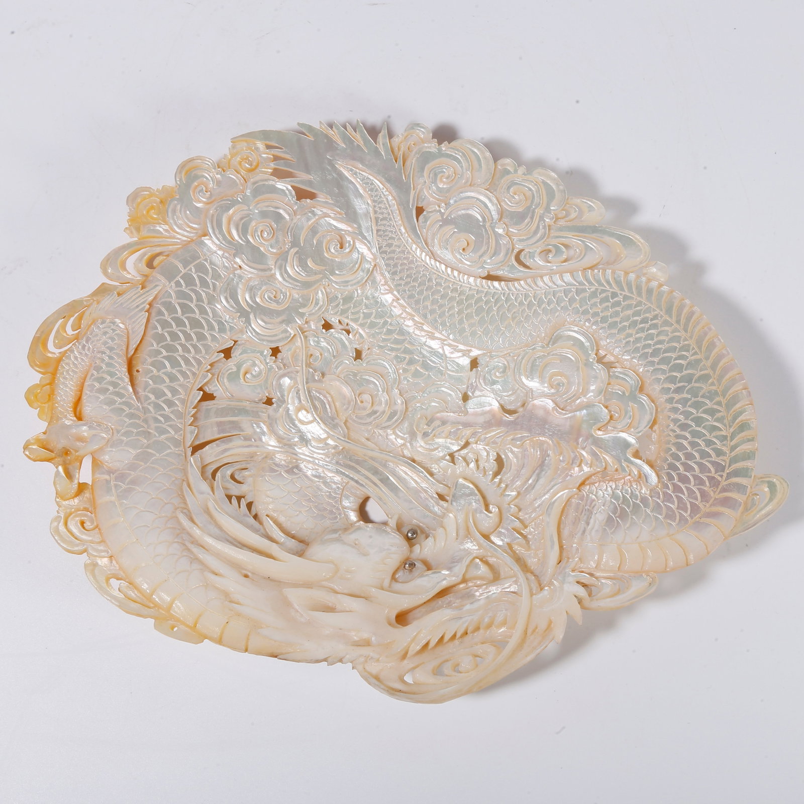A MOTHER-OF-PEARL CARVED ORNAMENT WITH DRAGON PATTERNS (1 of 9)