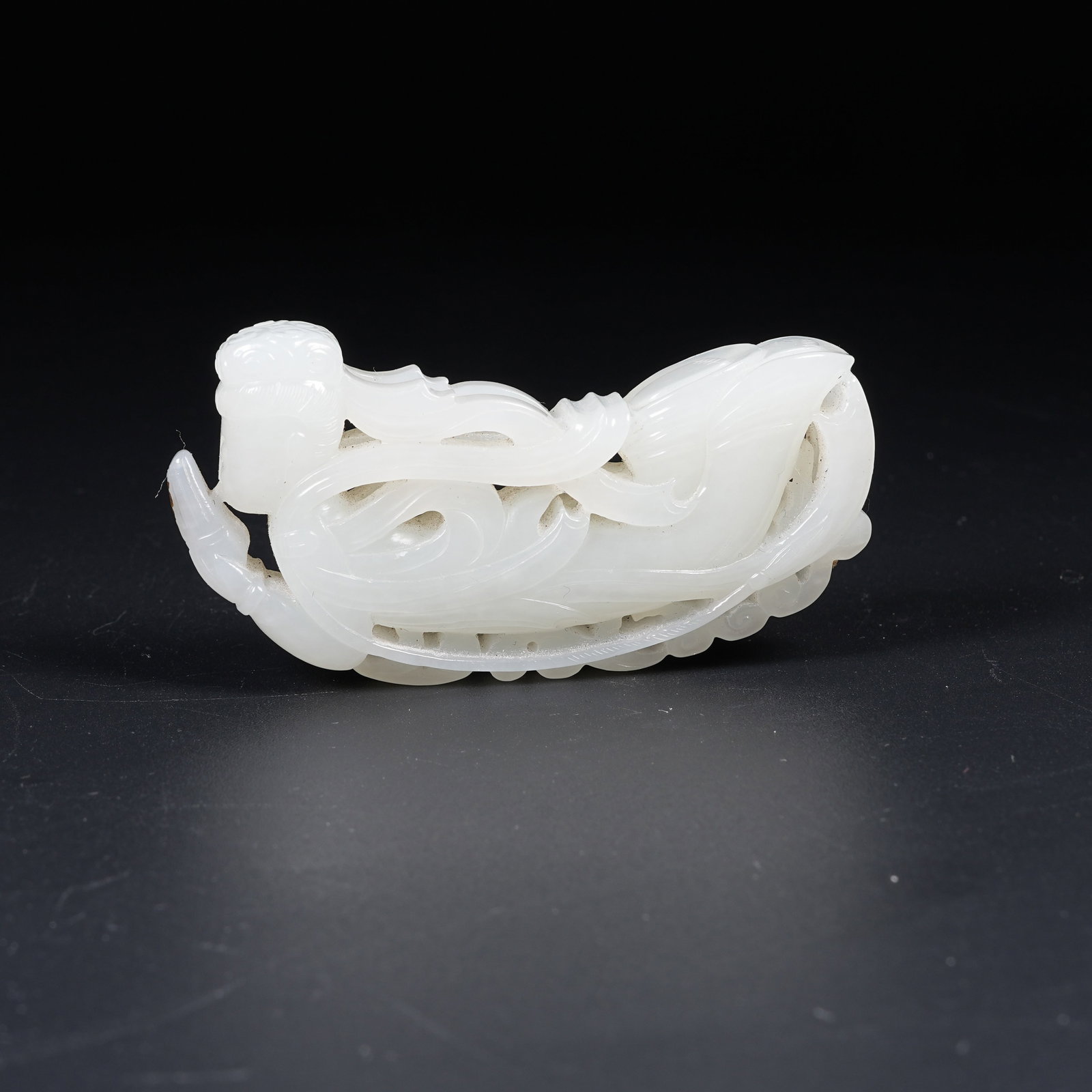 A WHITE HETIAN JADE FLYING APSARAS: White Hetian Jade Flying Apsaras