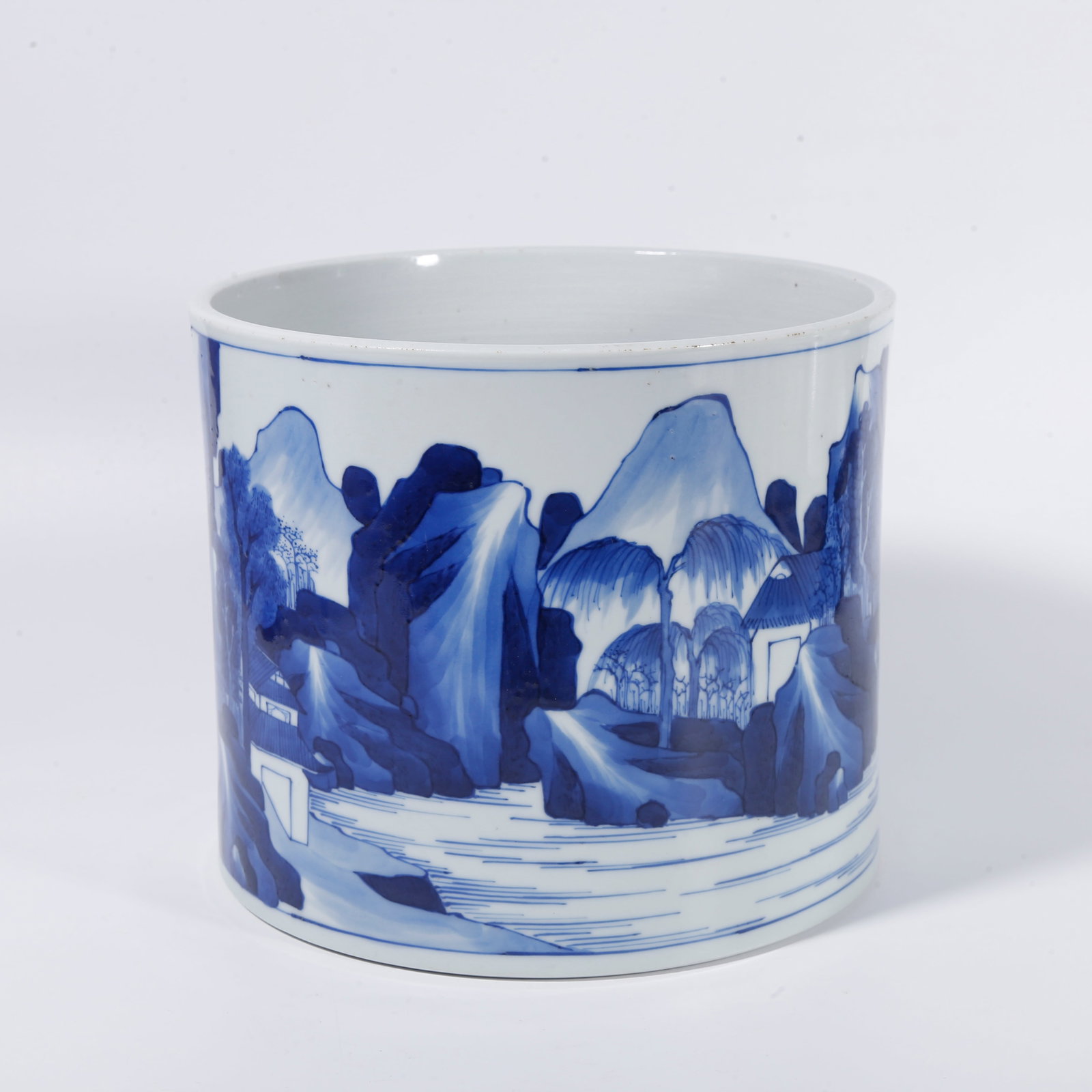 A BLUE AND WHITE BRUSH POT WITH LANDSCAPE PATTERNS (1 of 10)