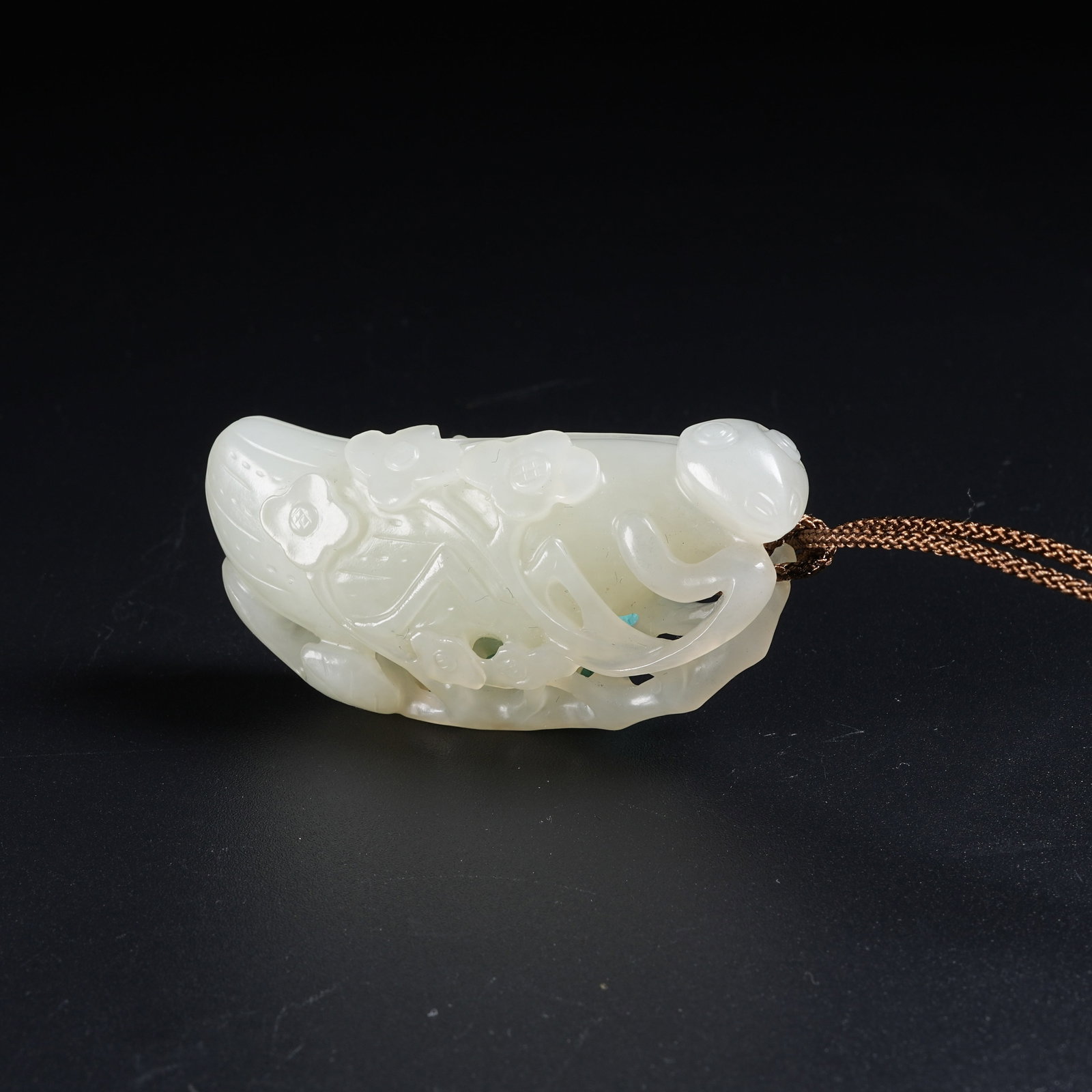 A HETIAN JADE HANGING ORNAMENT SYMBOLIZING RAPID PROMOTION (1 of 6)