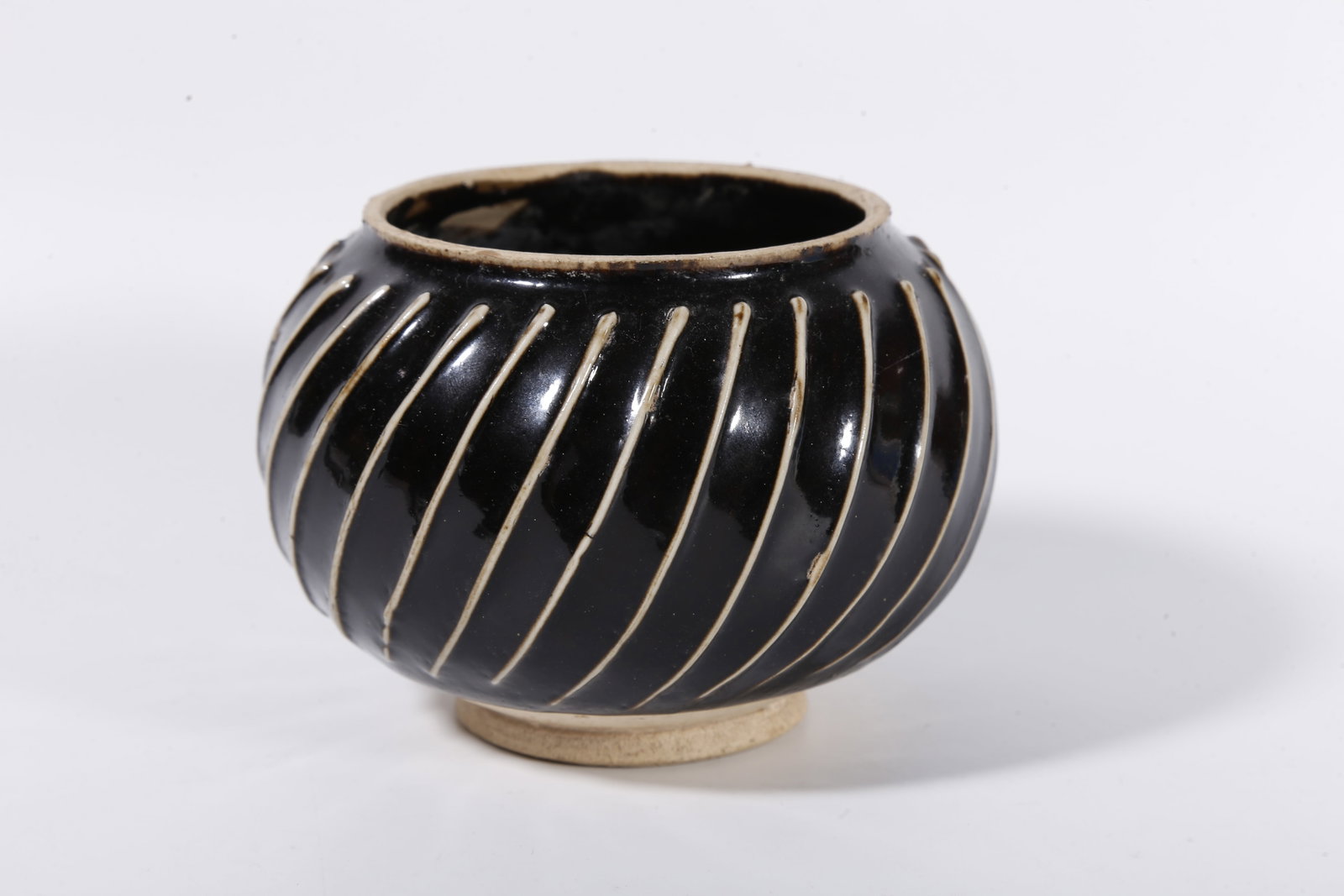 A DING KILN JAR WITH STRING PATTERNS - 3