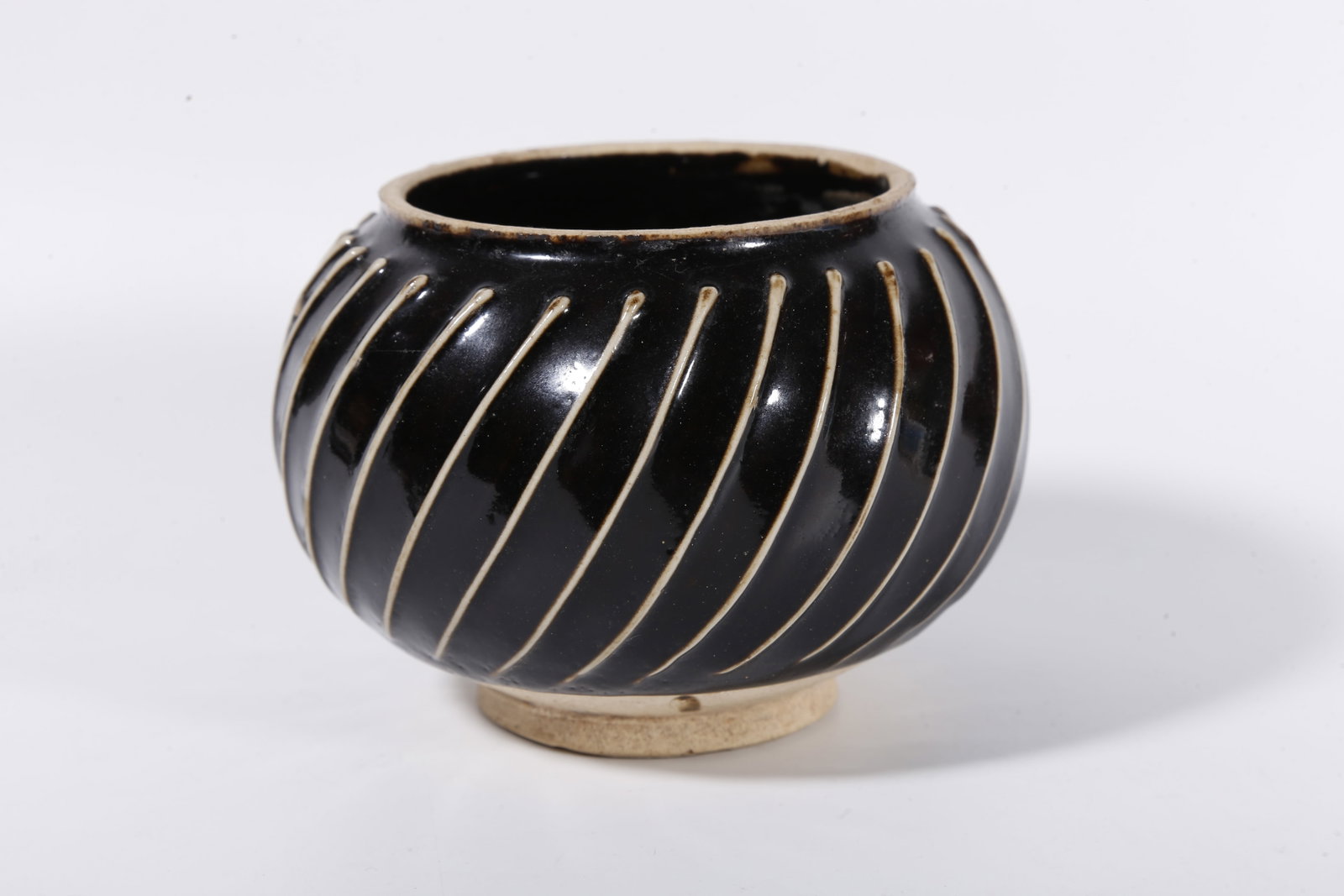 A DING KILN JAR WITH STRING PATTERNS - 4