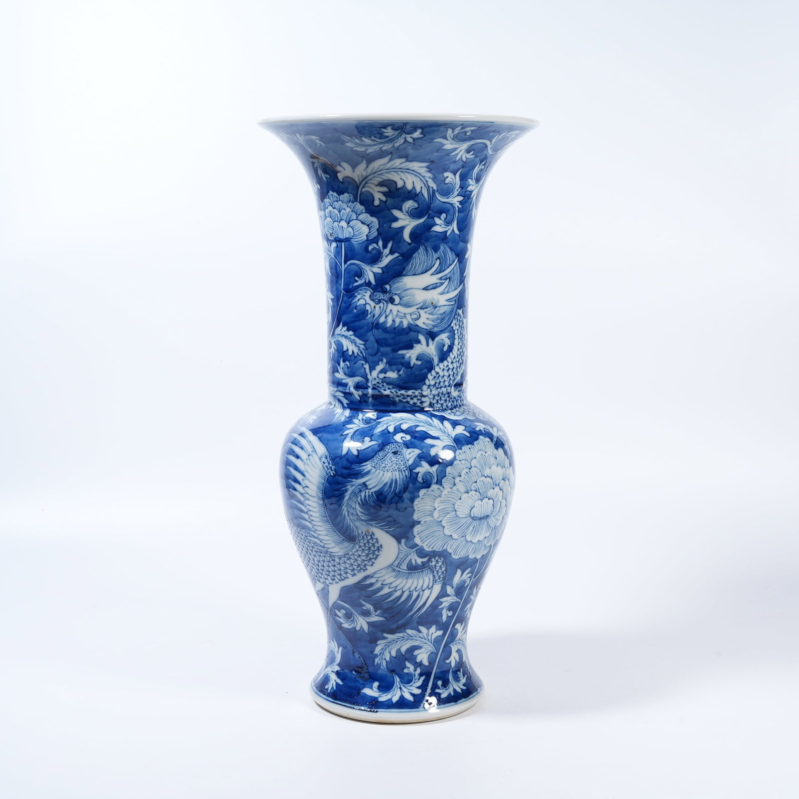 A BLUE AND WHITE GU VESSEL WITH DRAGON AND PHOENIX PATTERN (1 of 10)