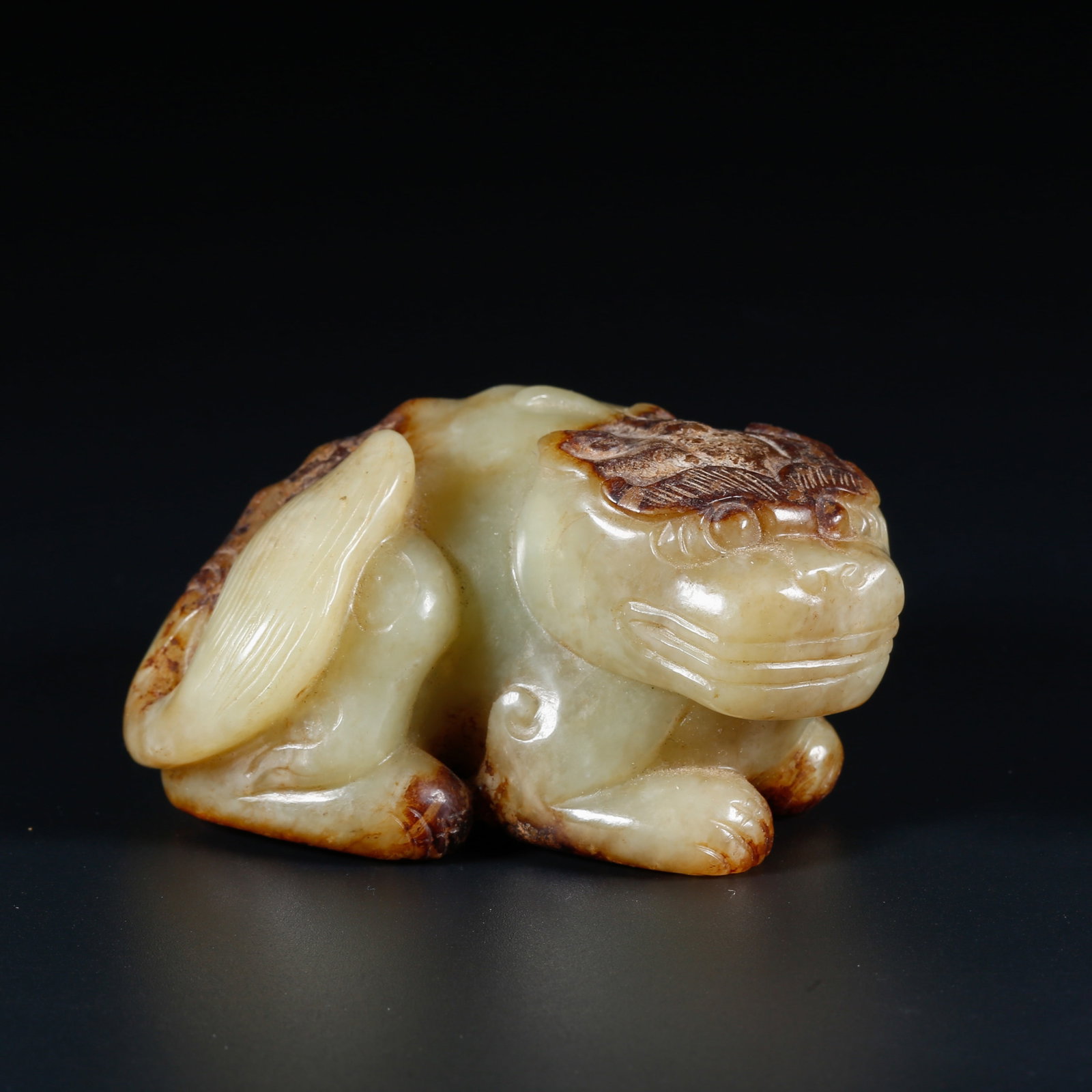 A HETIAN JADE BEAST ORNAMENT: Hetian Jade Beast Ornament