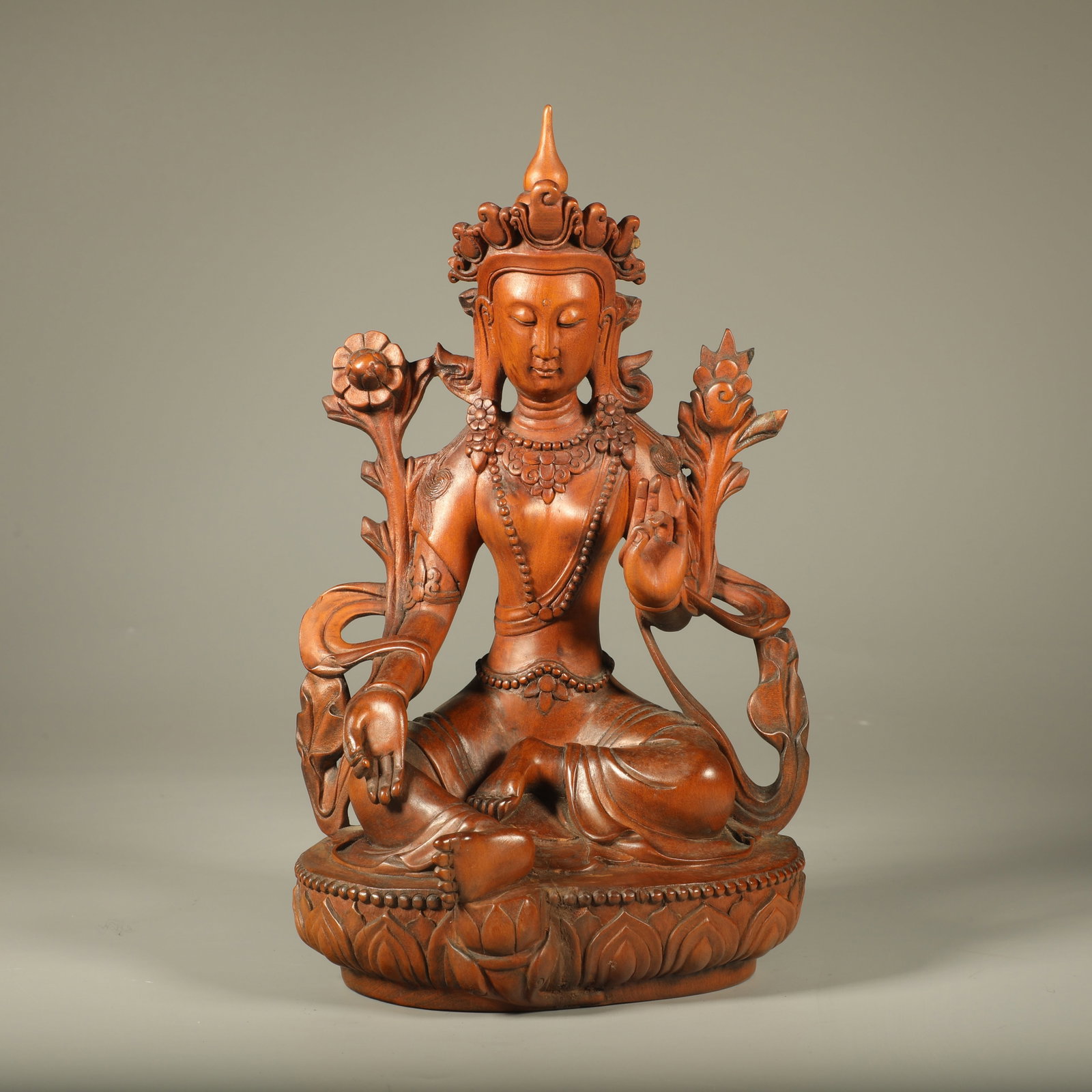 A BOXWOOD CARVED STATUE OF TARA (1 of 7)
