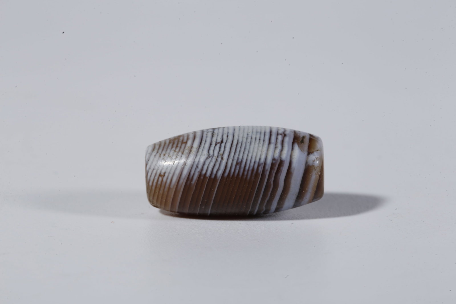 A THREAD-WRAPPED AGATE DZI BEAD - 2