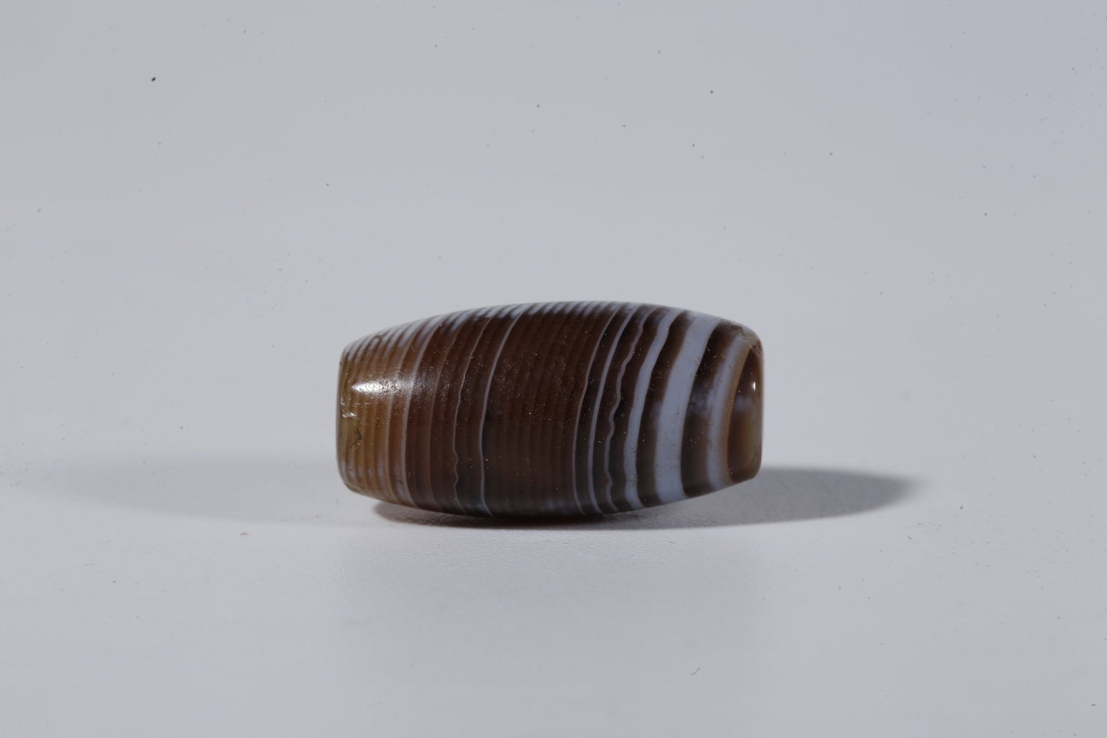 A THREAD-WRAPPED AGATE DZI BEAD - 3