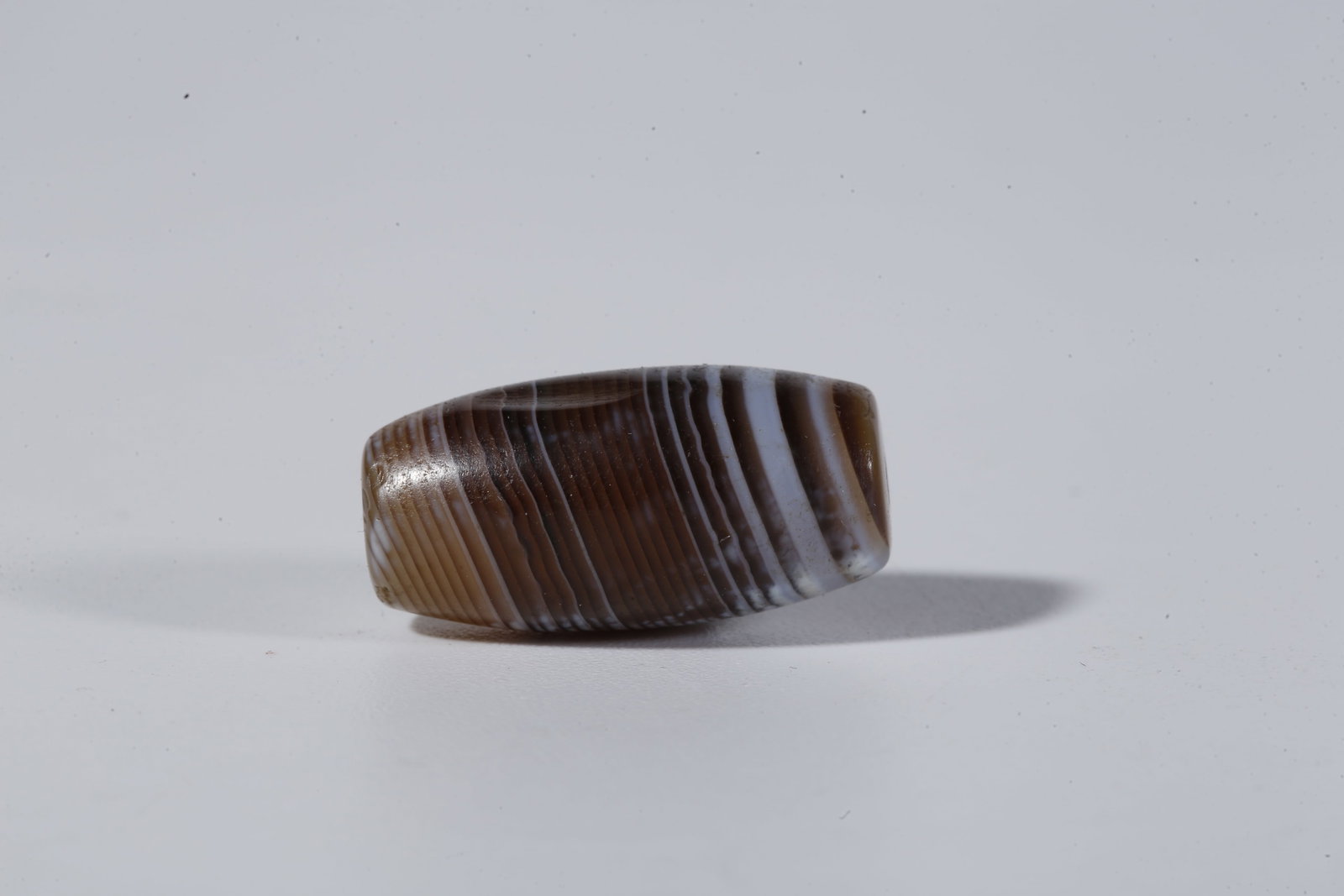 A THREAD-WRAPPED AGATE DZI BEAD - 4