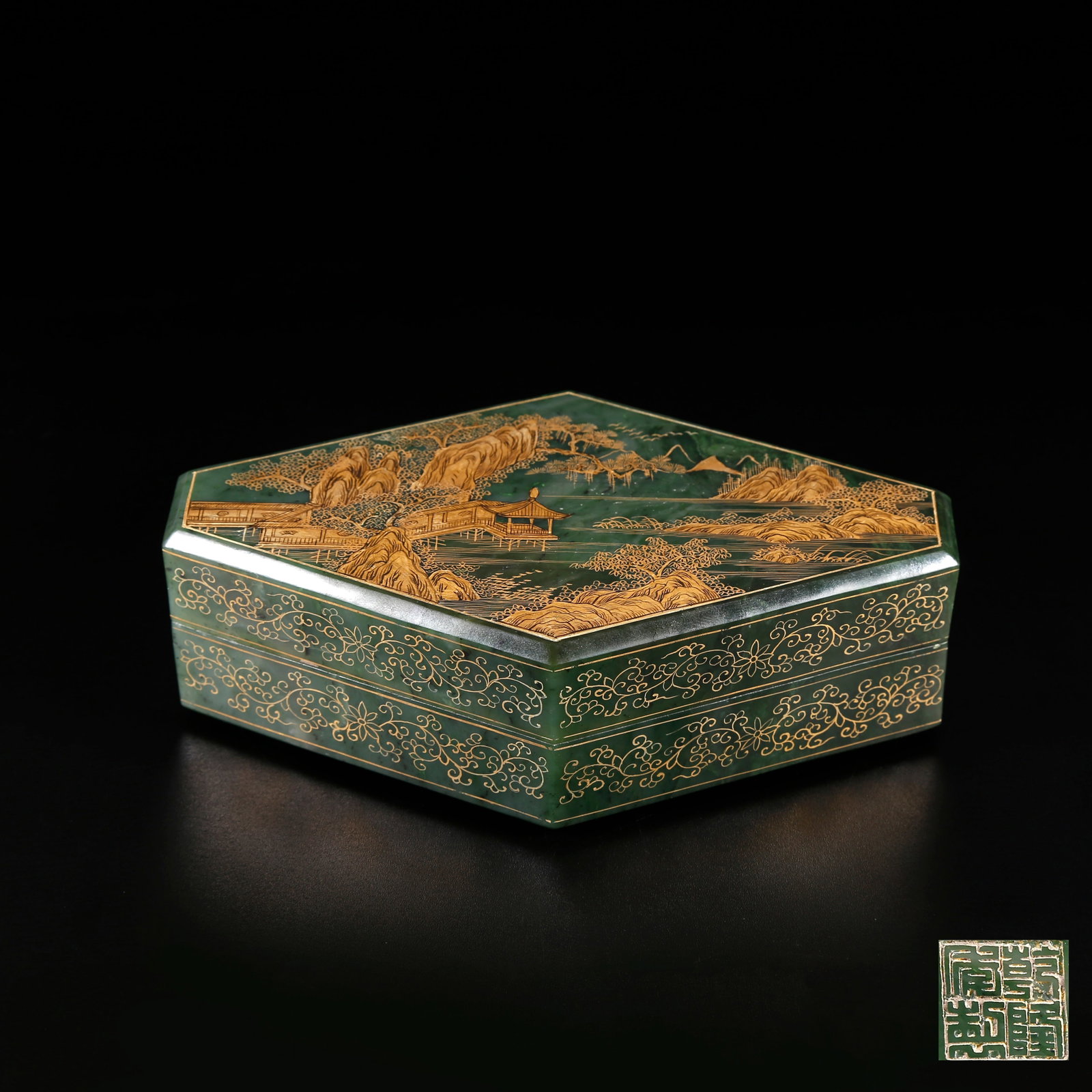A GREEN HETIAN JADE COVERED BOX CARVED AND GILDED WITH LANDSCAPE PATTERN: Green Hetian Jade Covered Box Carved and Gilded with Landscape Pattern