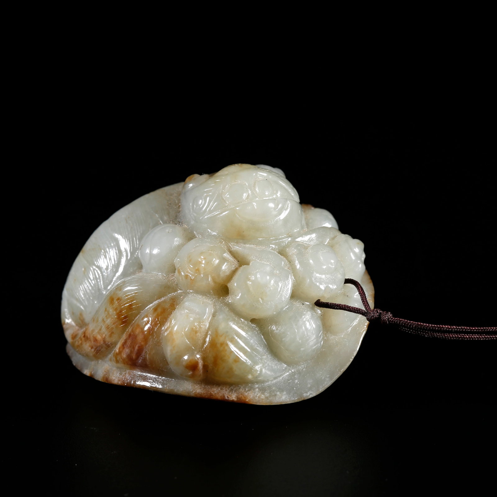 A HETIAN JADE HAND PIECE CARVED IN BEAST SHAPE: Hetian Jade Hand Piece Carved in Beast Shape