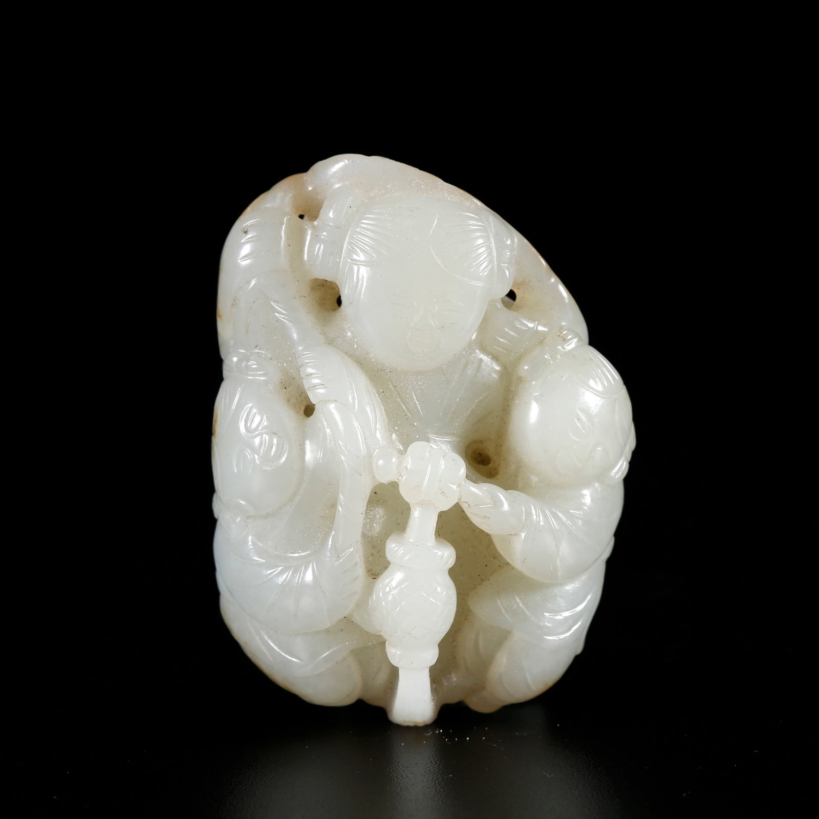 A HETIAN JADE PENDANT CARVED IN BOY SHAPE (1 of 9)
